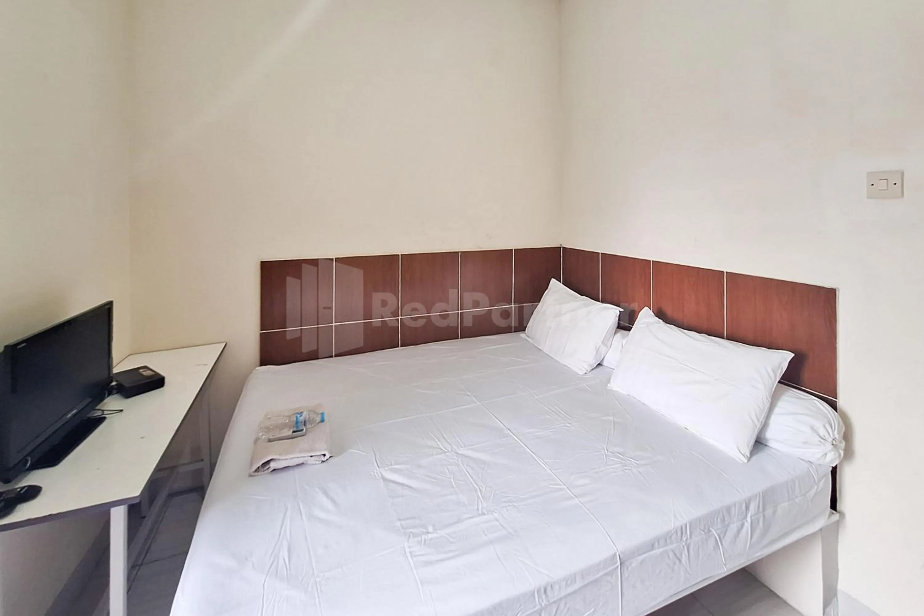 Bed in Joy Homestay At Pulomas RedPartner