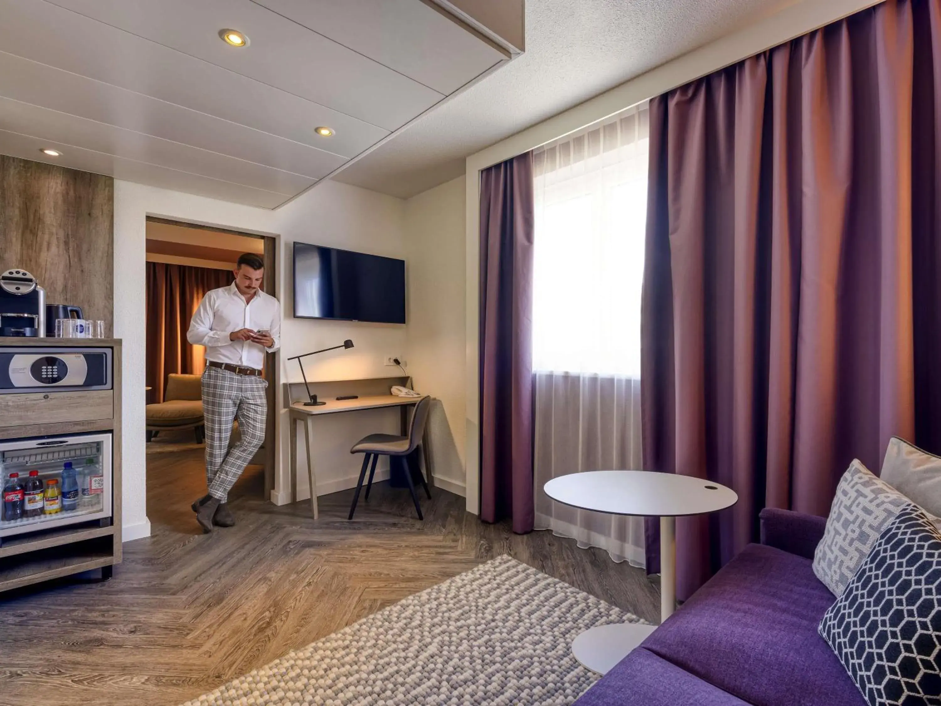 Two Bedroom Suite with Double Bed and Sofa in Novotel Zurich City West Two Bedroom Suite with Double Bed and Sofa in Novotel Zurich City West