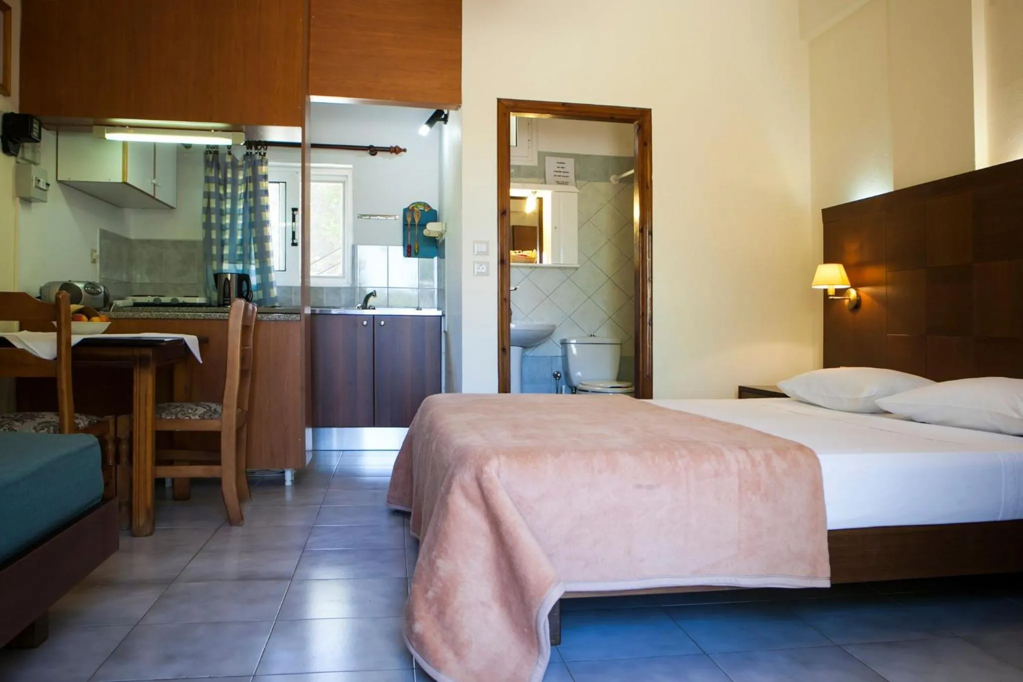 Bed in Summer Garden Αpartments & Studios