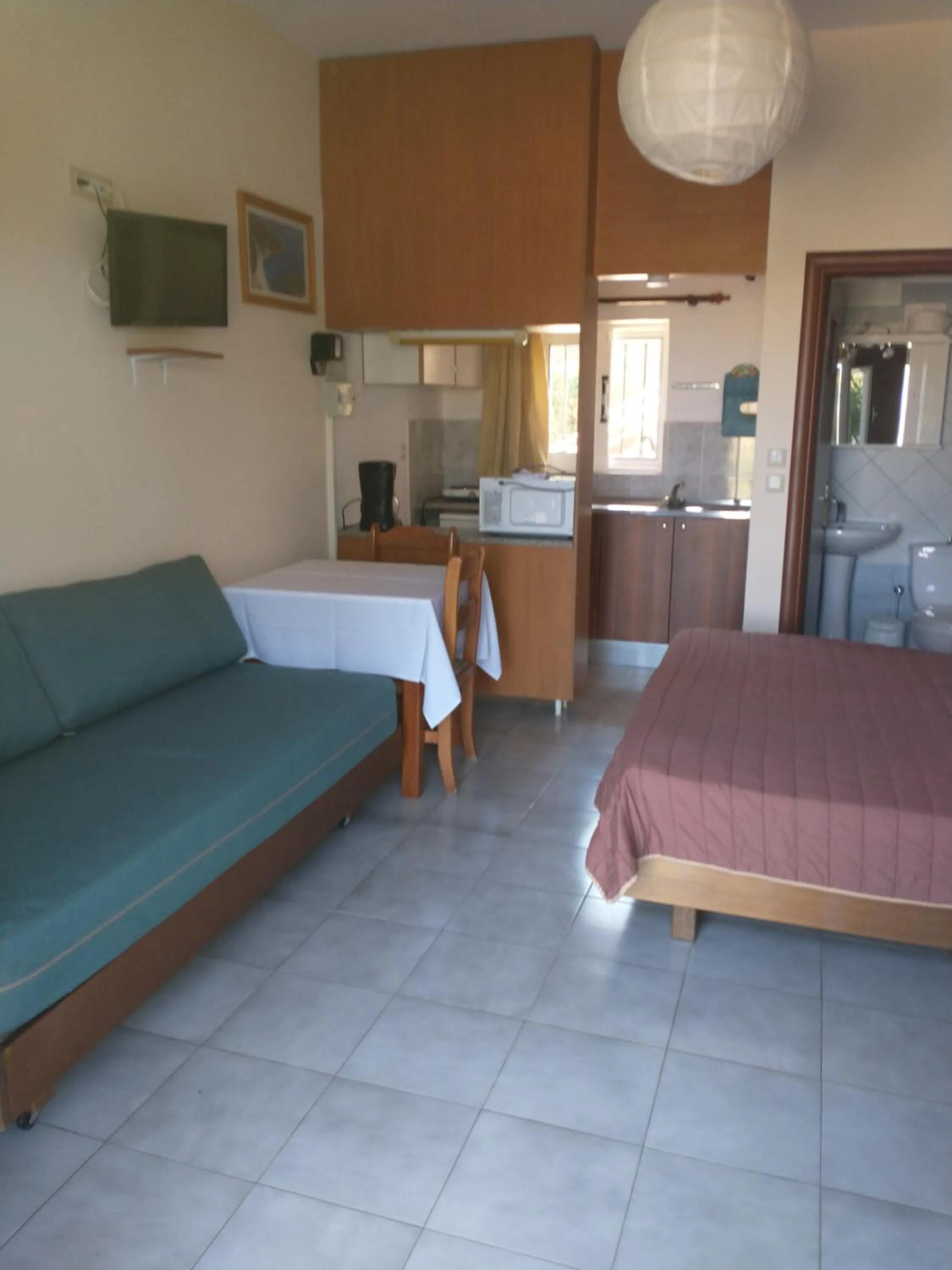 Bed in Summer Garden Αpartments & Studios