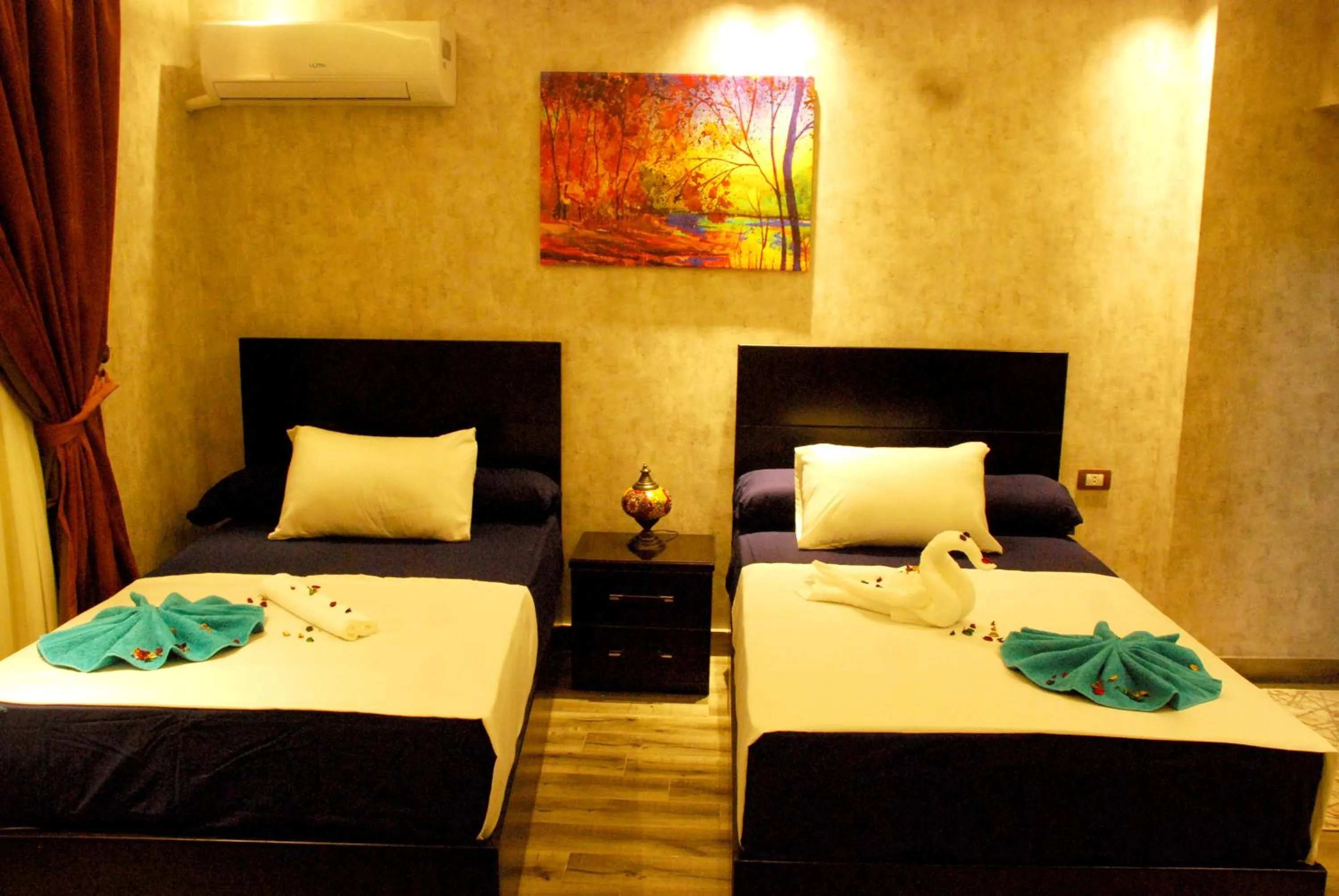 Bed in Pyramids Planet Hotel