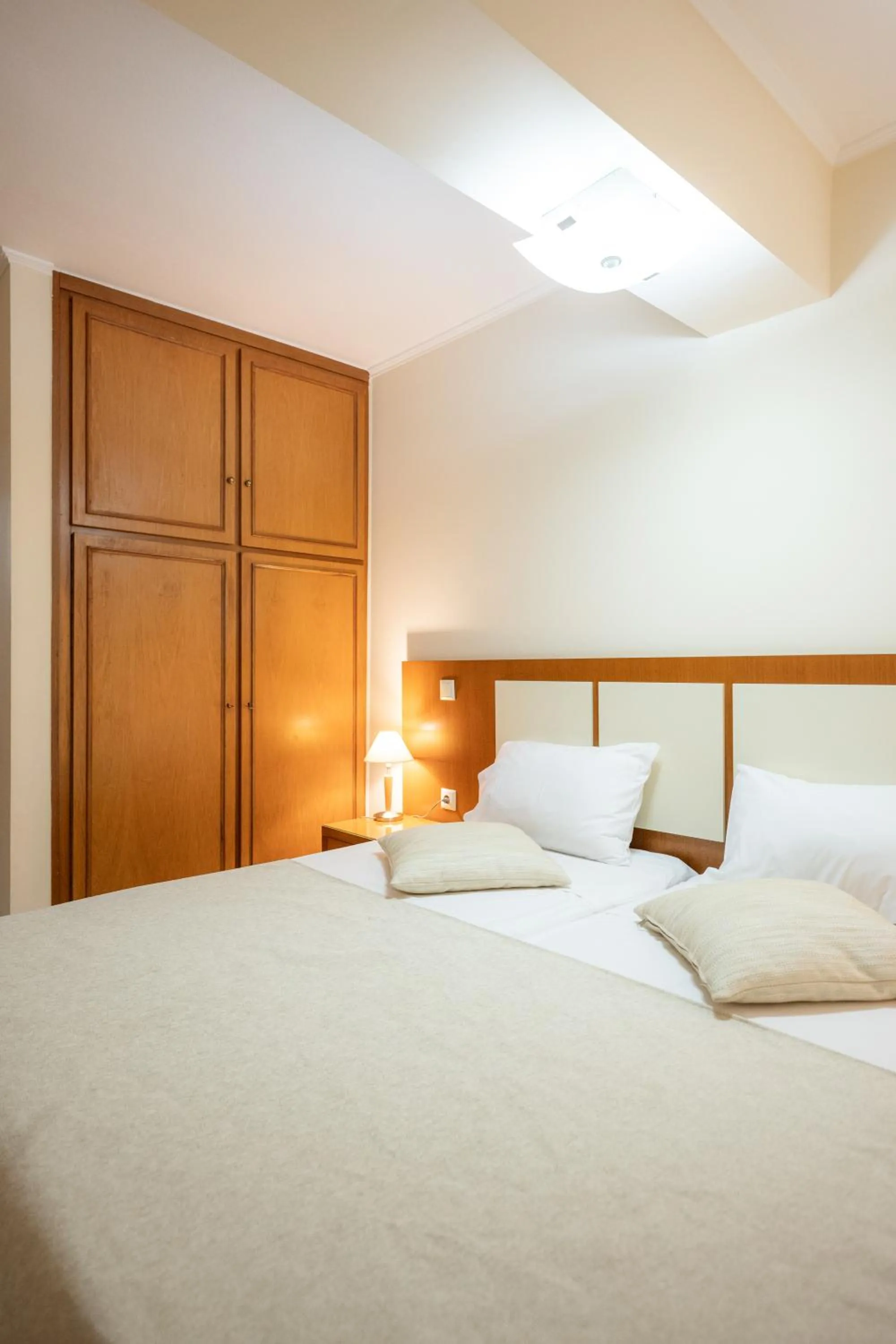 Bed in Esperides Beach Hotel Apartments