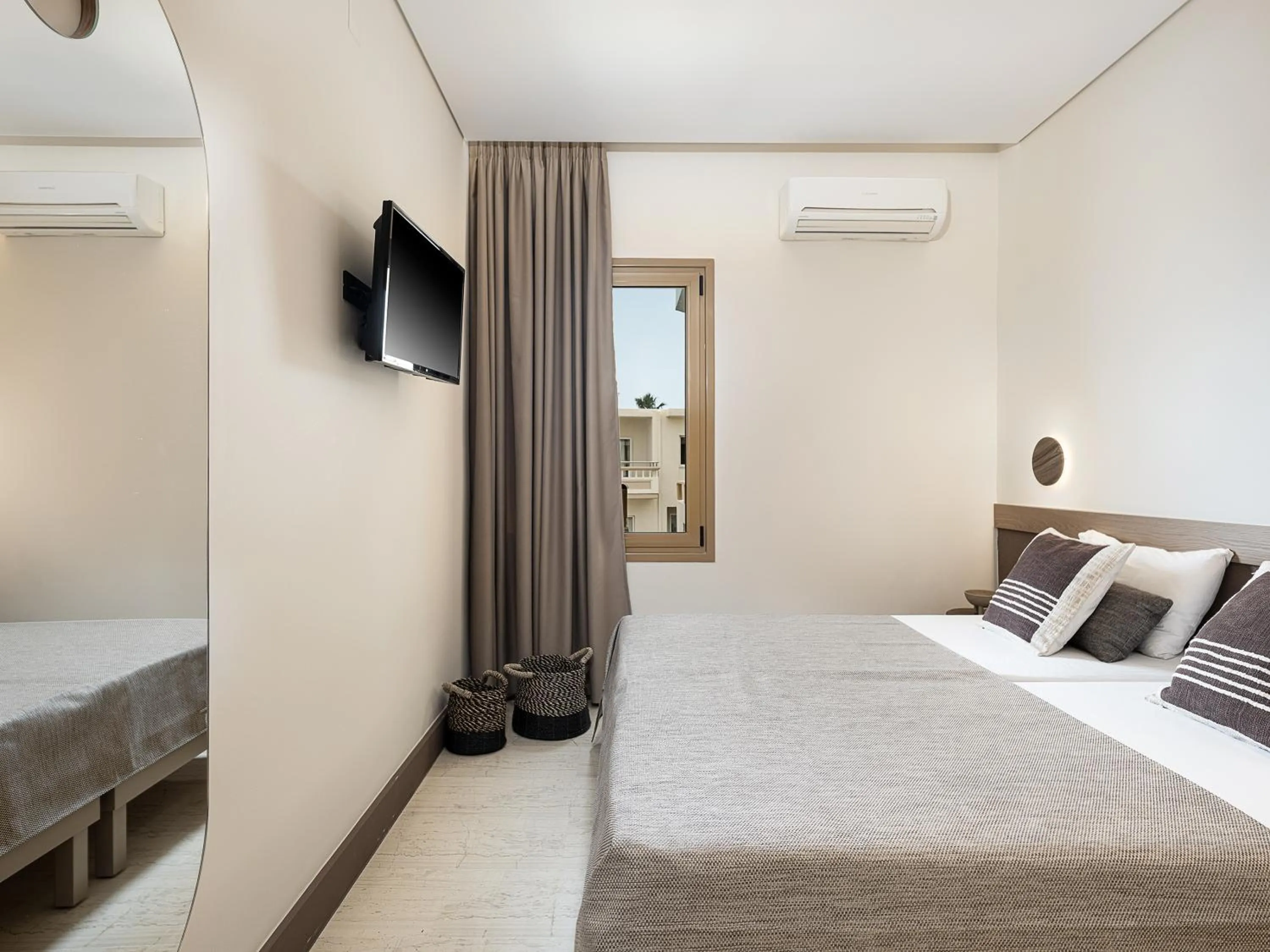 Bed in Esperides Beach Hotel Apartments