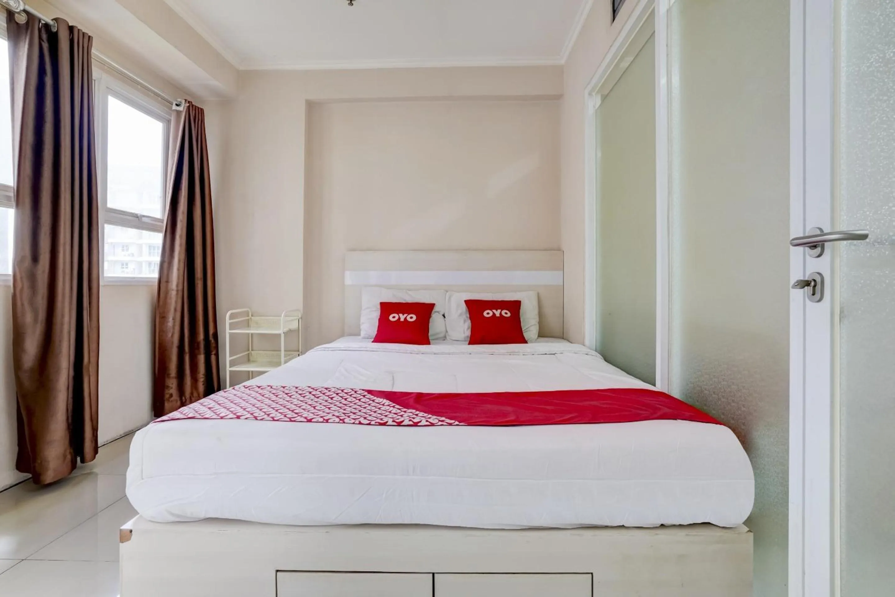 Bedroom in Collection O 90205 Queen Rent Apartment Gateway Pasteur