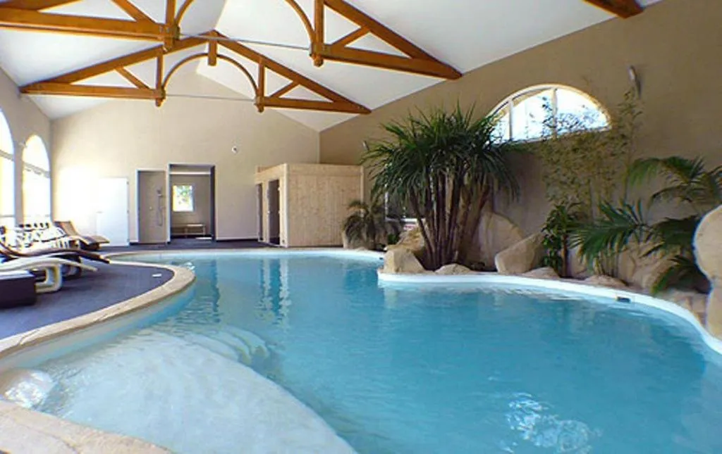 Swimming pool in Hôtel de la Louée