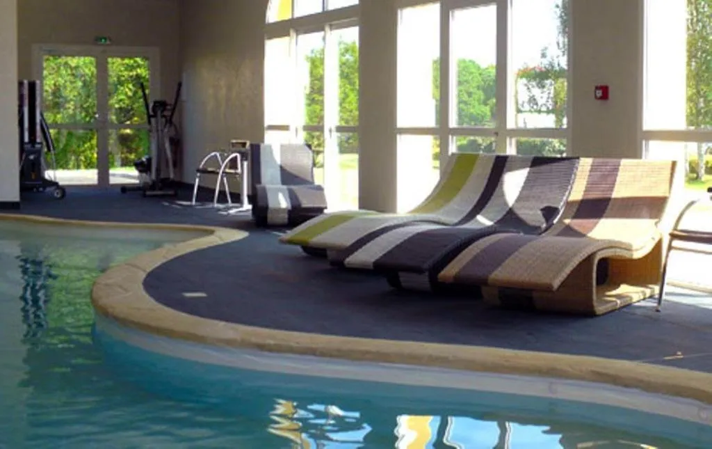 Swimming pool in Hôtel de la Louée