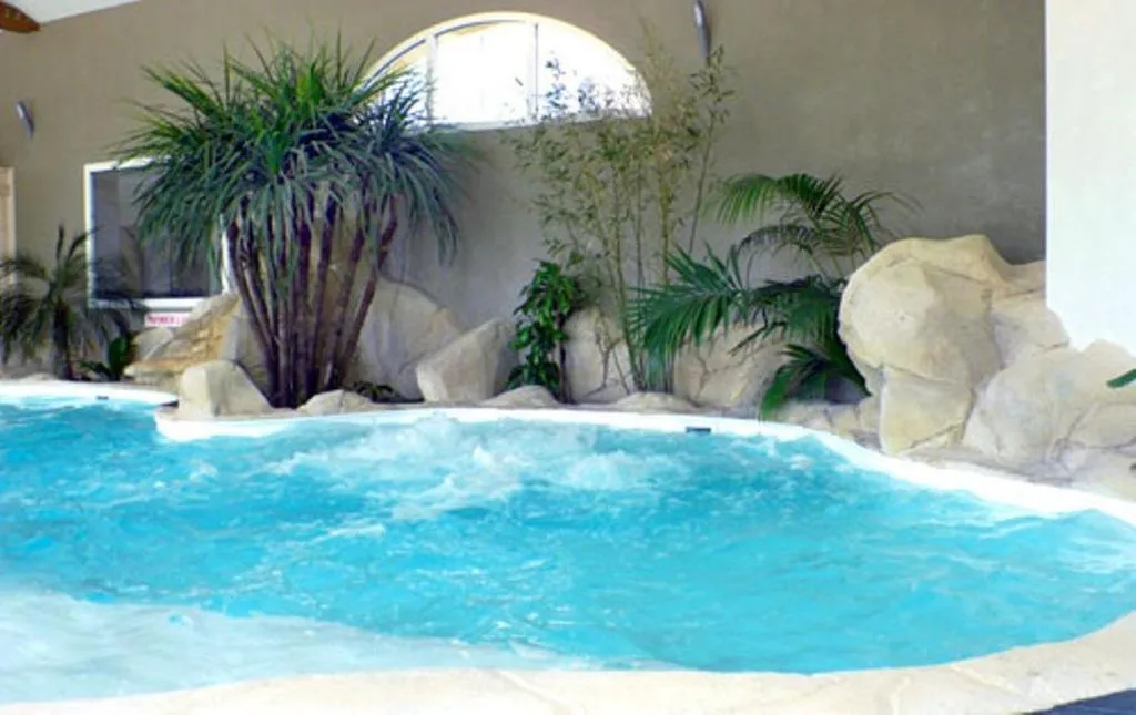 Swimming pool in Hôtel de la Louée