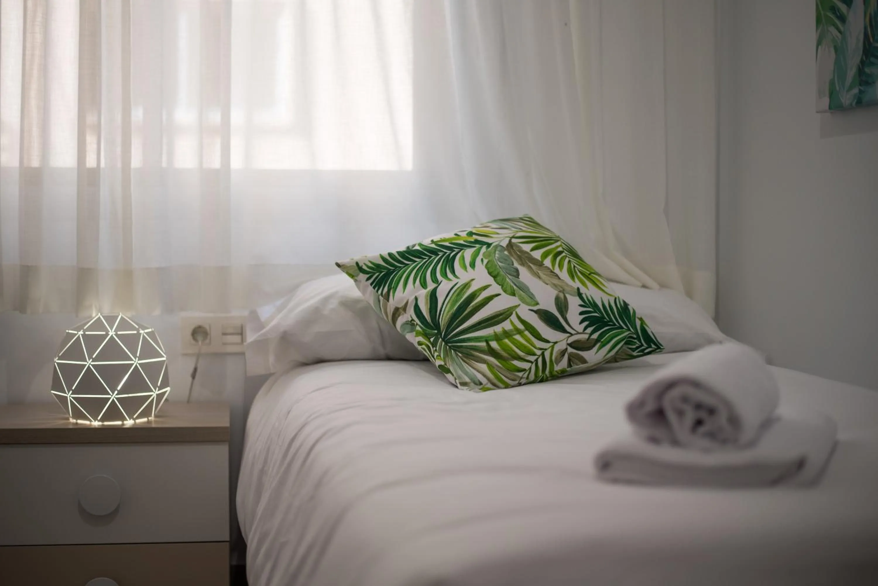 Decorative detail, Bed in tuGuest Station 2 apartment