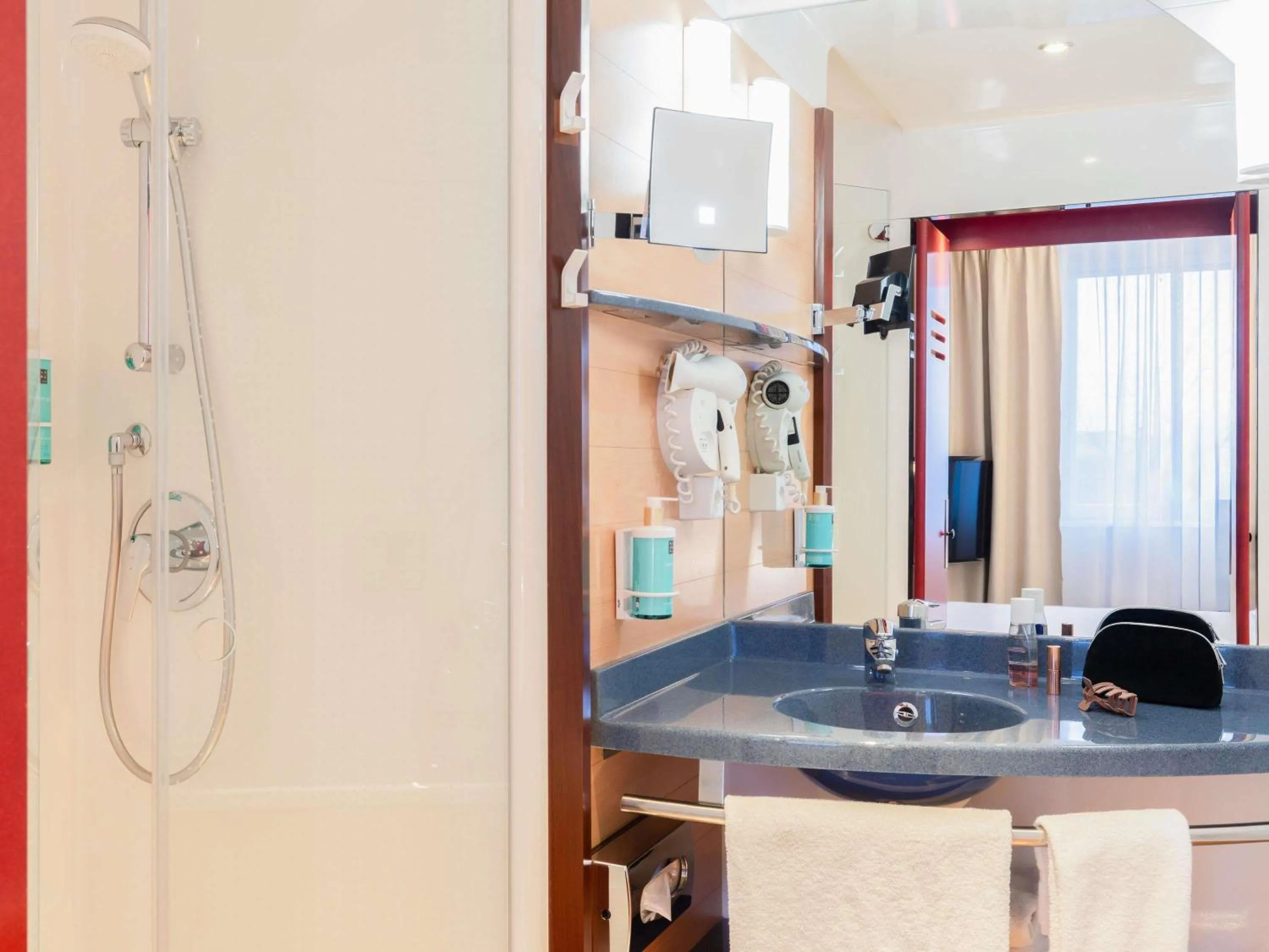 Bedroom in Novotel Suites Genève Aéroport