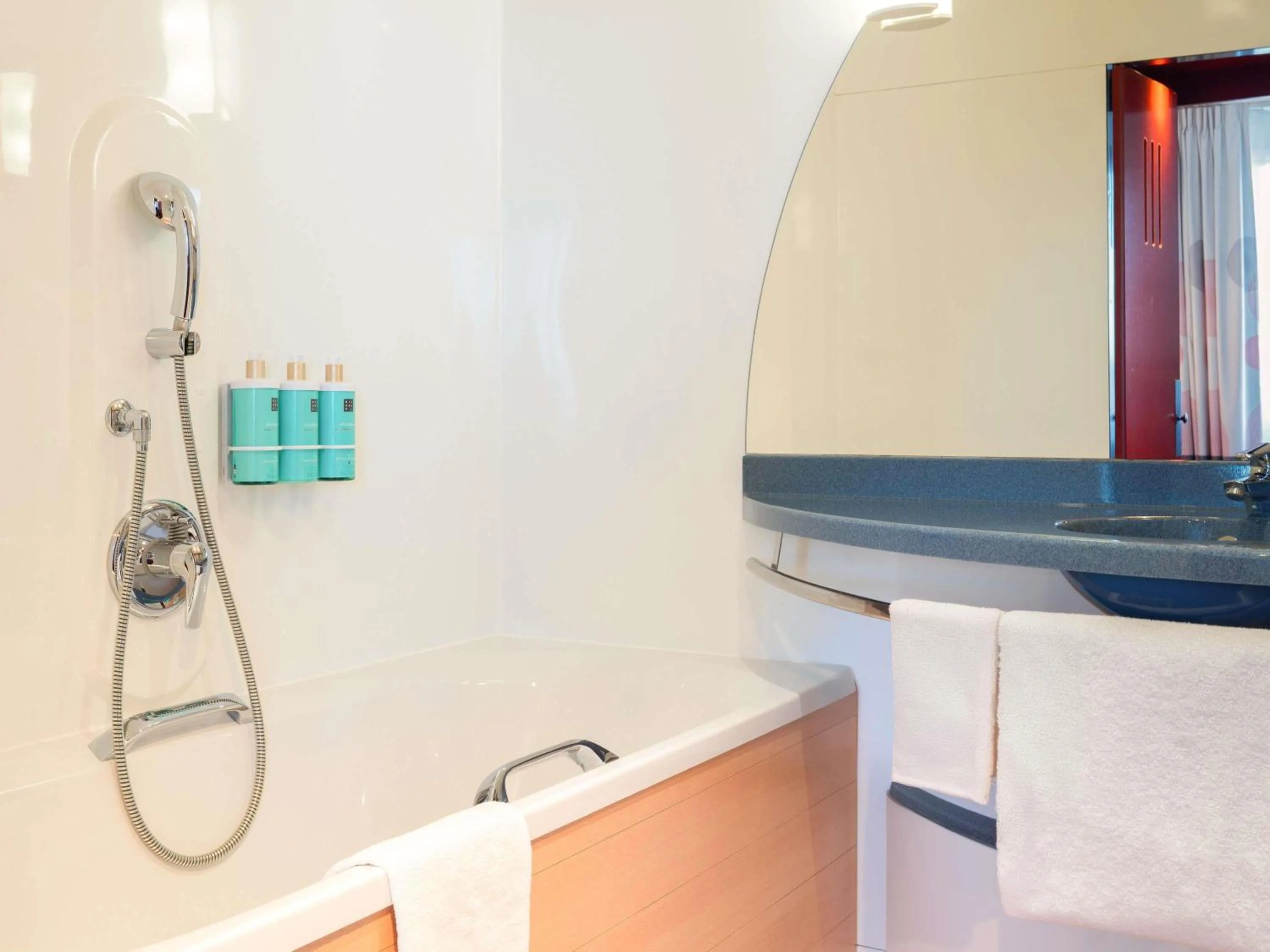 Bedroom in Novotel Suites Genève Aéroport