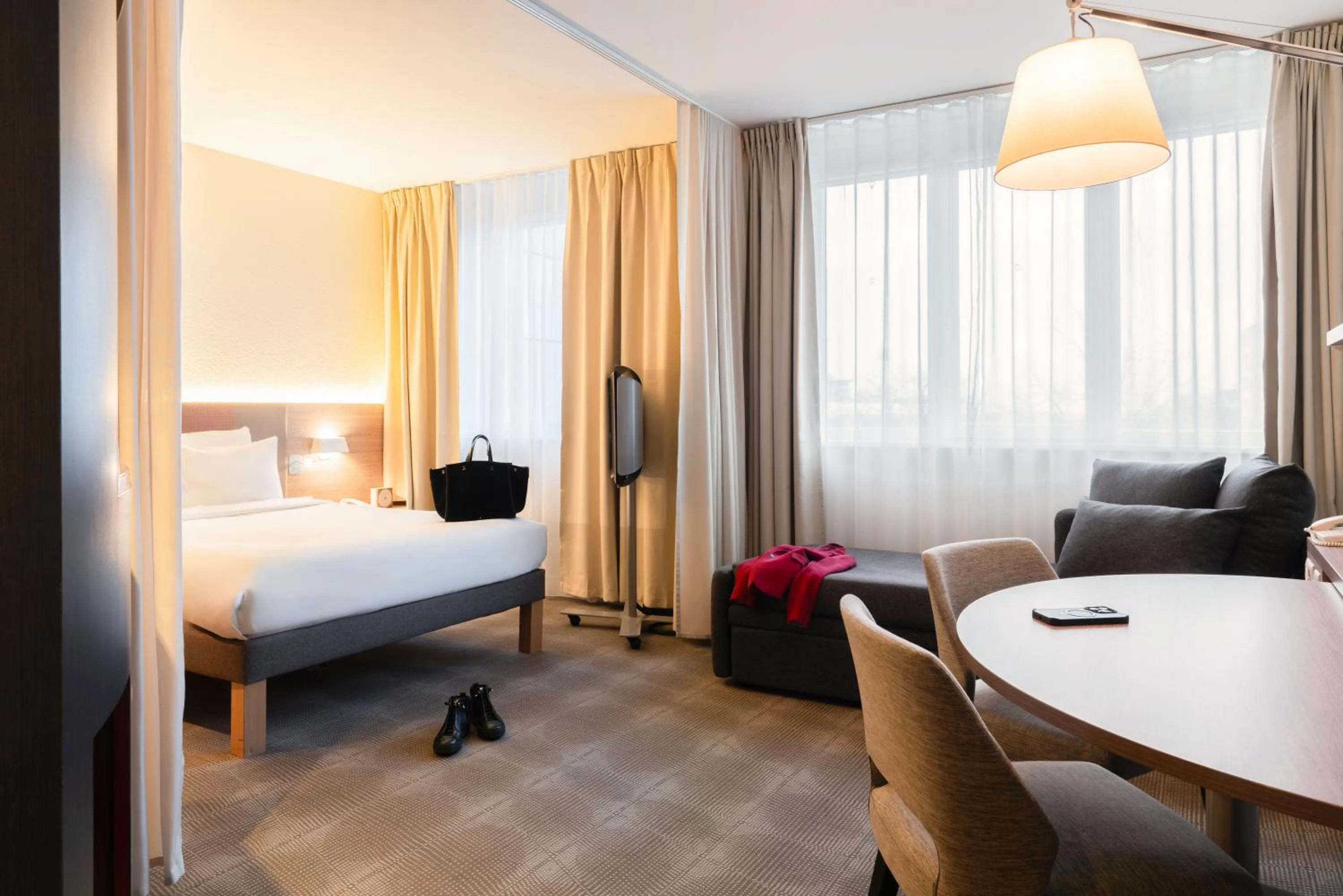 Bed in Novotel Suites Genève Aéroport