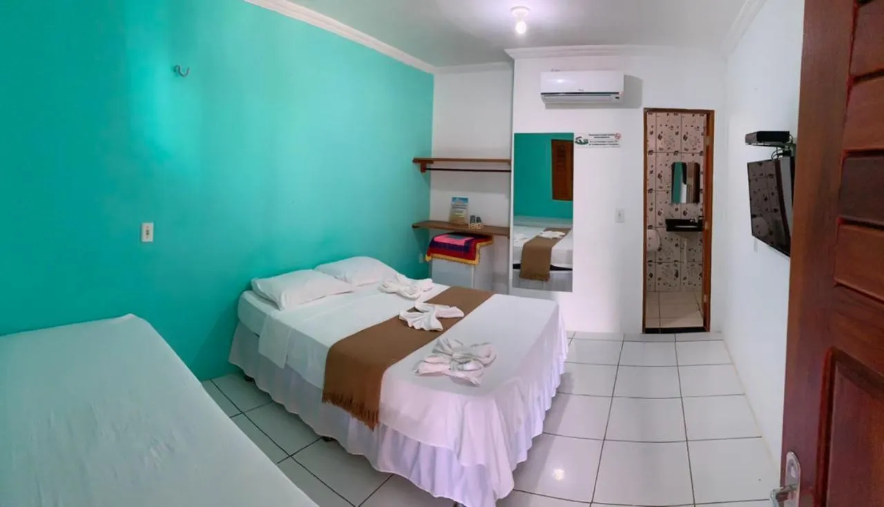 Bed in Pousada Numei de Jeri