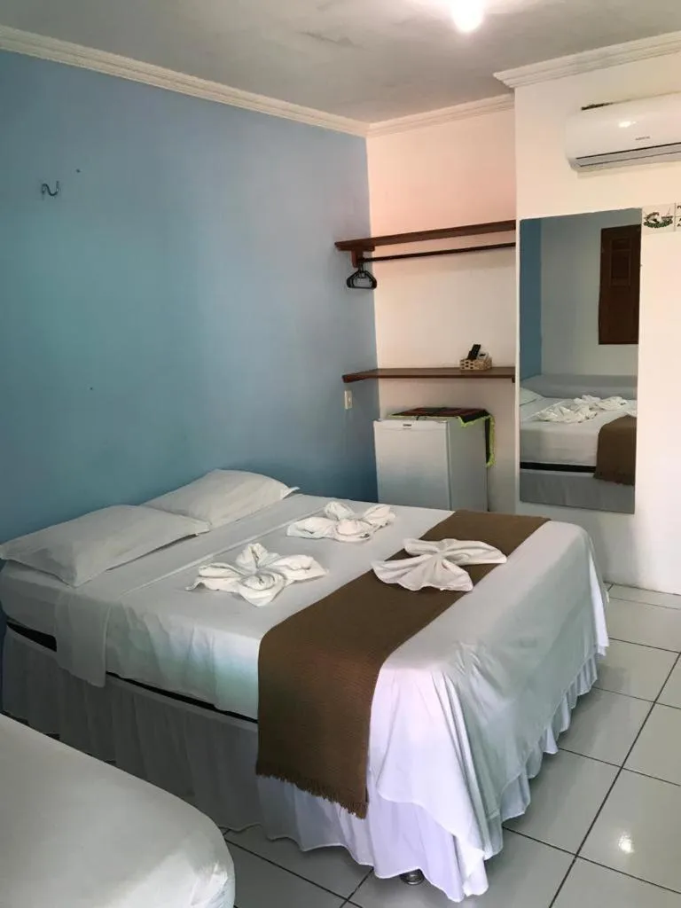 Bed in Pousada Numei de Jeri