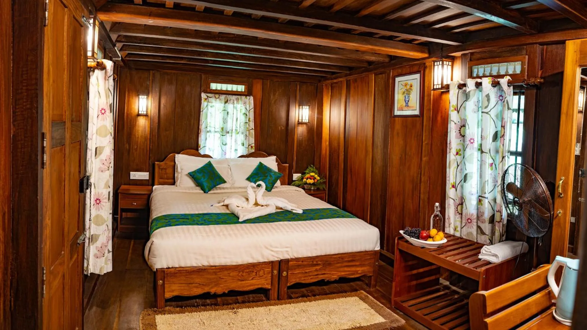 Bed in Kalpavanam Heritage Resort
