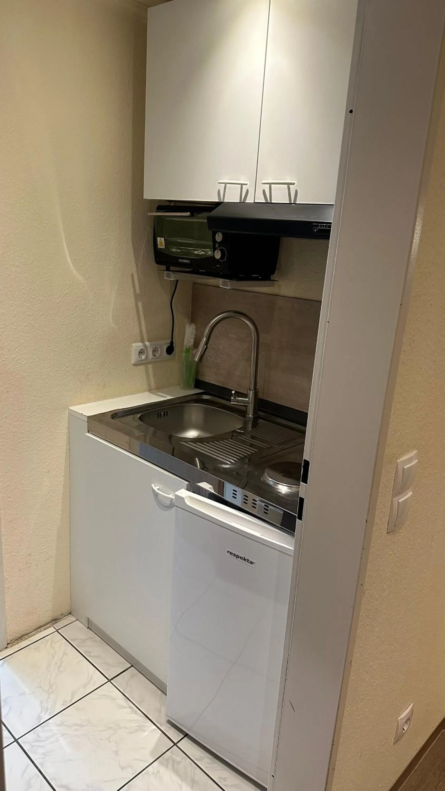 Kitchen or kitchenette in Hotel Falk