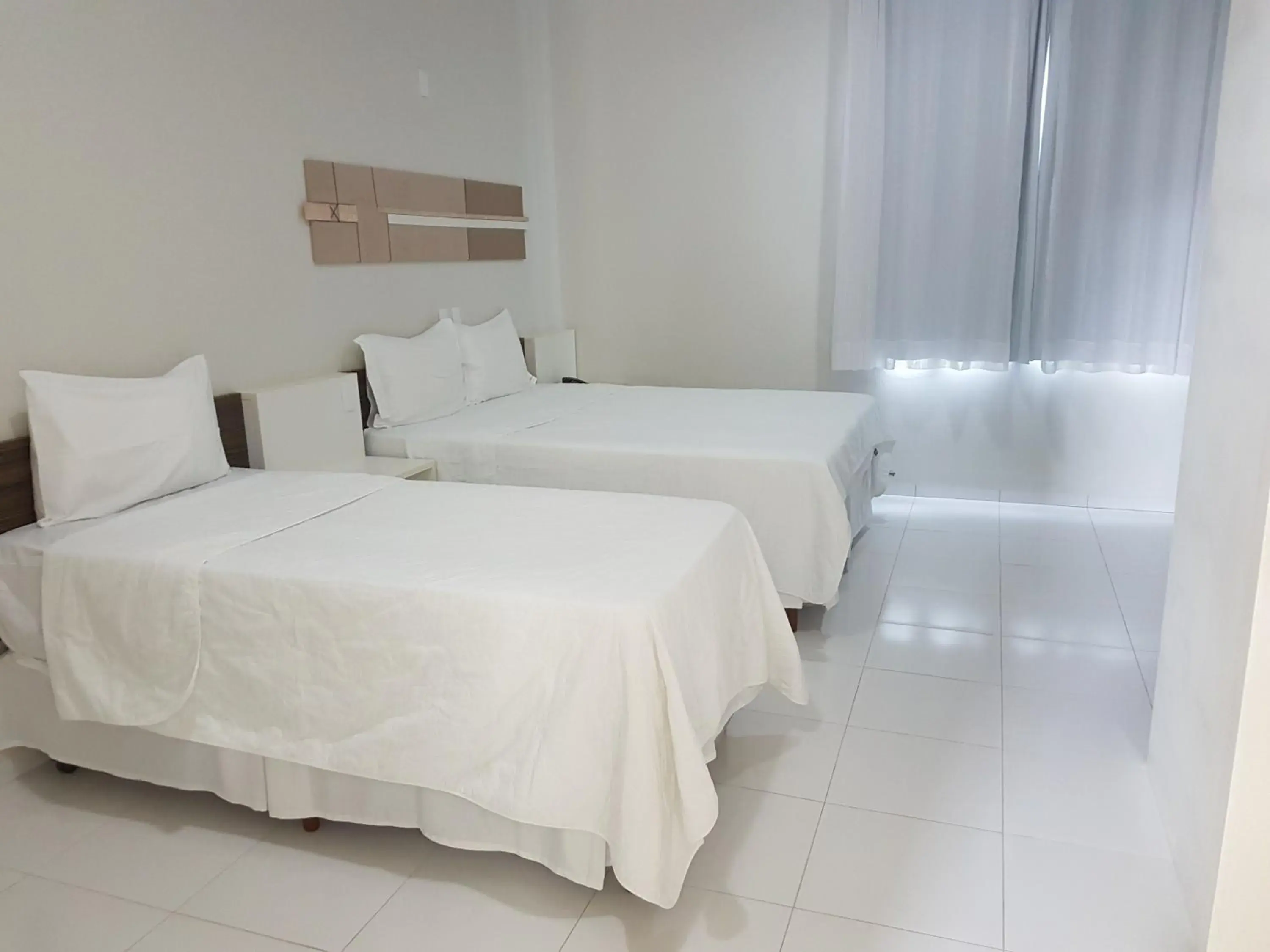 Triple Room (2 Adults + 1 Child) - single occupancy in Portinari Palace Hotel Triple Room (2 Adults + 1 Child) - single occupancy in Portinari Palace Hotel