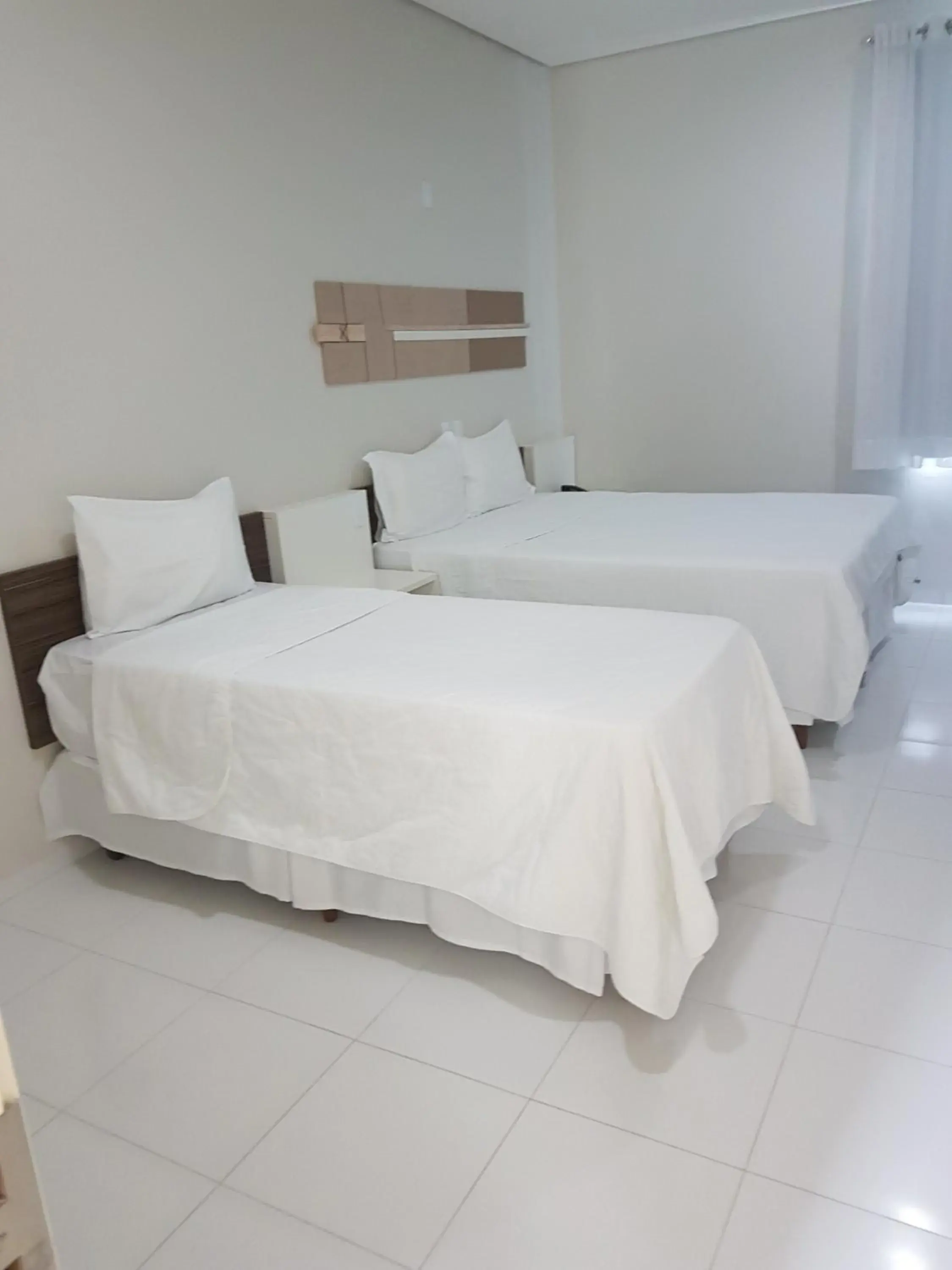 Triple Room (2 Adults + 1 Child) - single occupancy in Portinari Palace Hotel Triple Room (2 Adults + 1 Child) - single occupancy in Portinari Palace Hotel