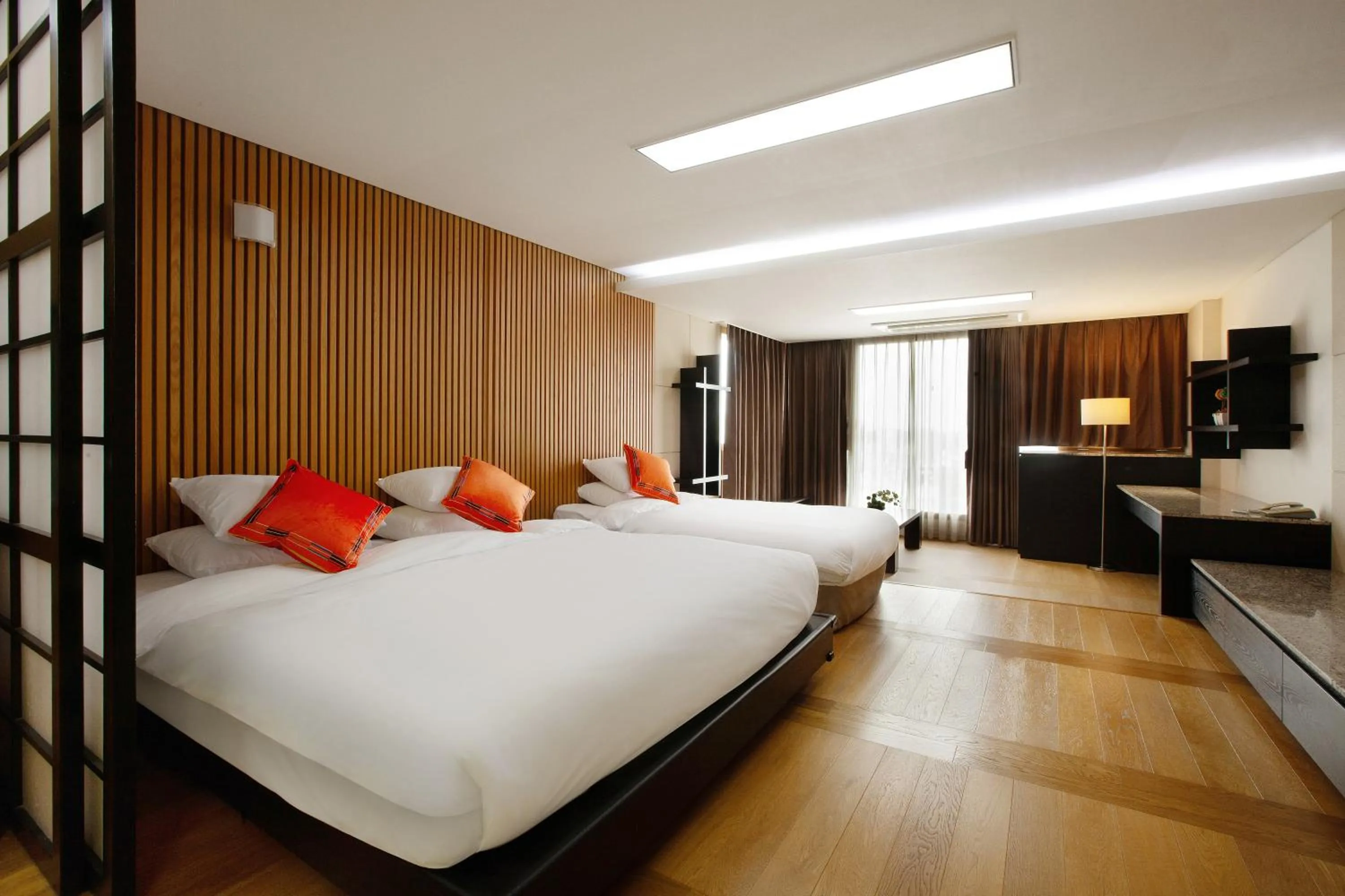 Decorative detail, Bed in Shin Shin Hotel Jeju Ocean