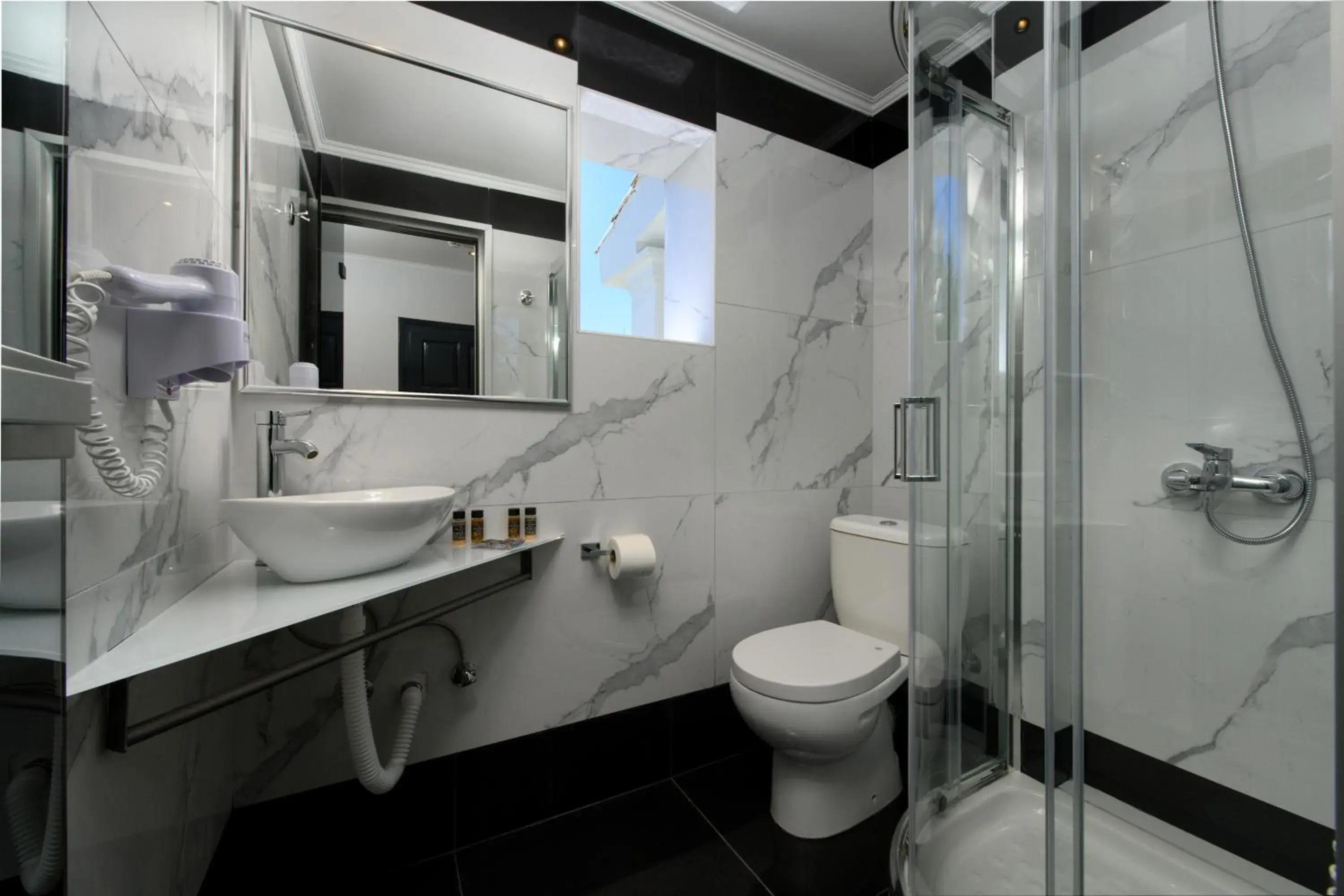 Bathroom in Corfu SunGate Hotel Bathroom in Corfu SunGate Hotel