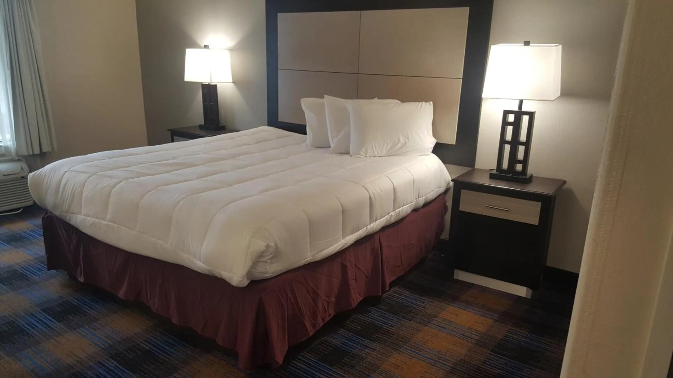 Bed in REGENCY INN & SUITES