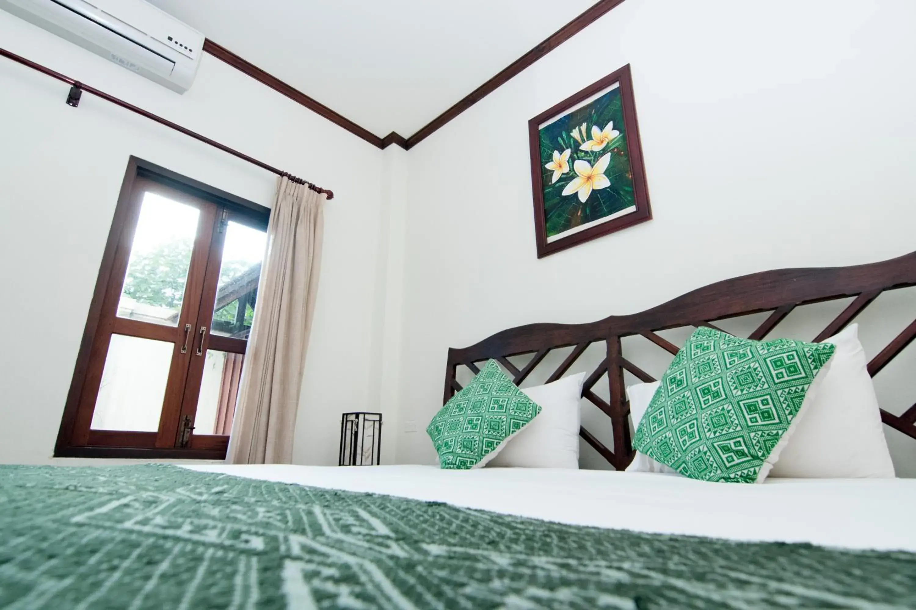 Bed in Luang Prabang Legend Hotel Bed in Luang Prabang Legend Hotel