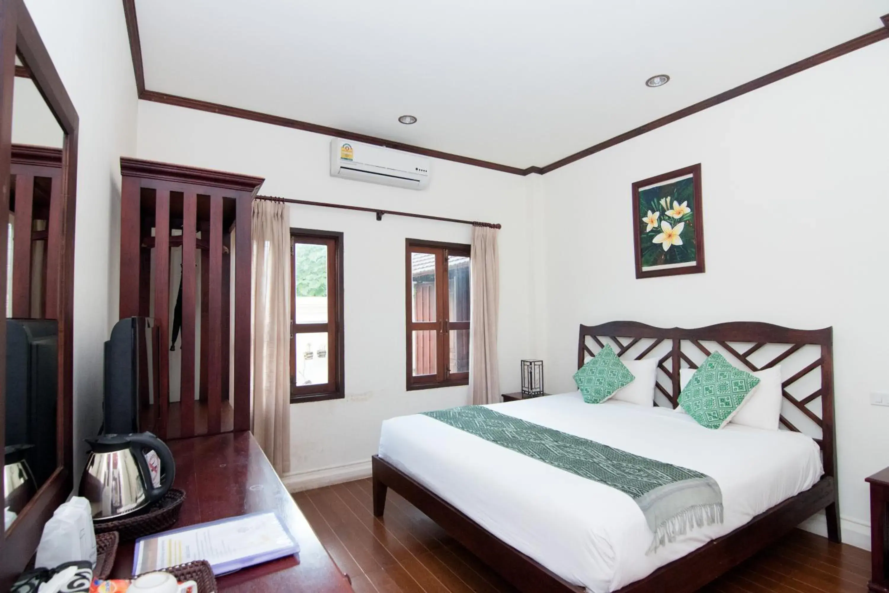 Bed in Luang Prabang Legend Hotel Bed in Luang Prabang Legend Hotel
