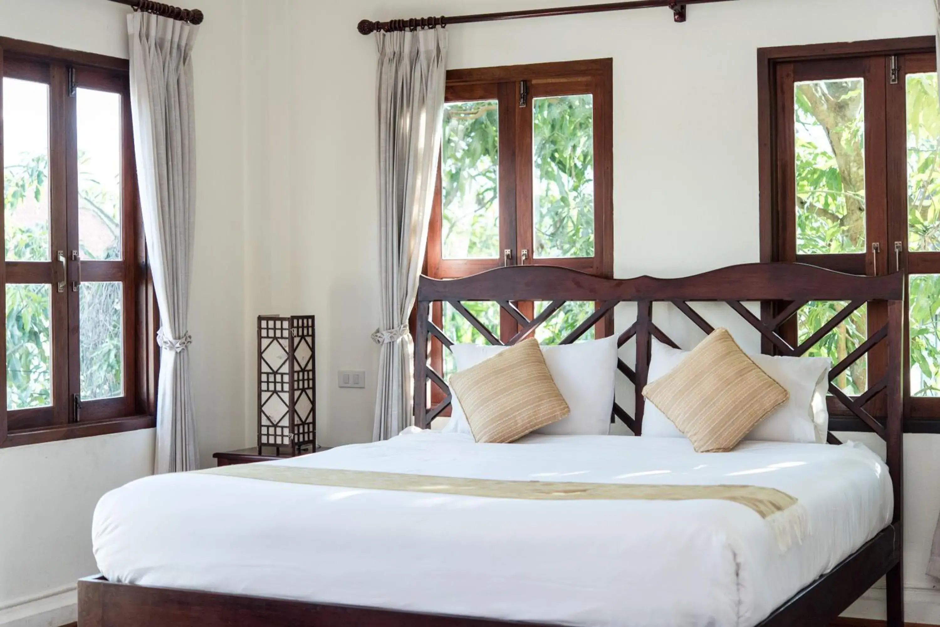 Bed in Luang Prabang Legend Hotel Bed in Luang Prabang Legend Hotel