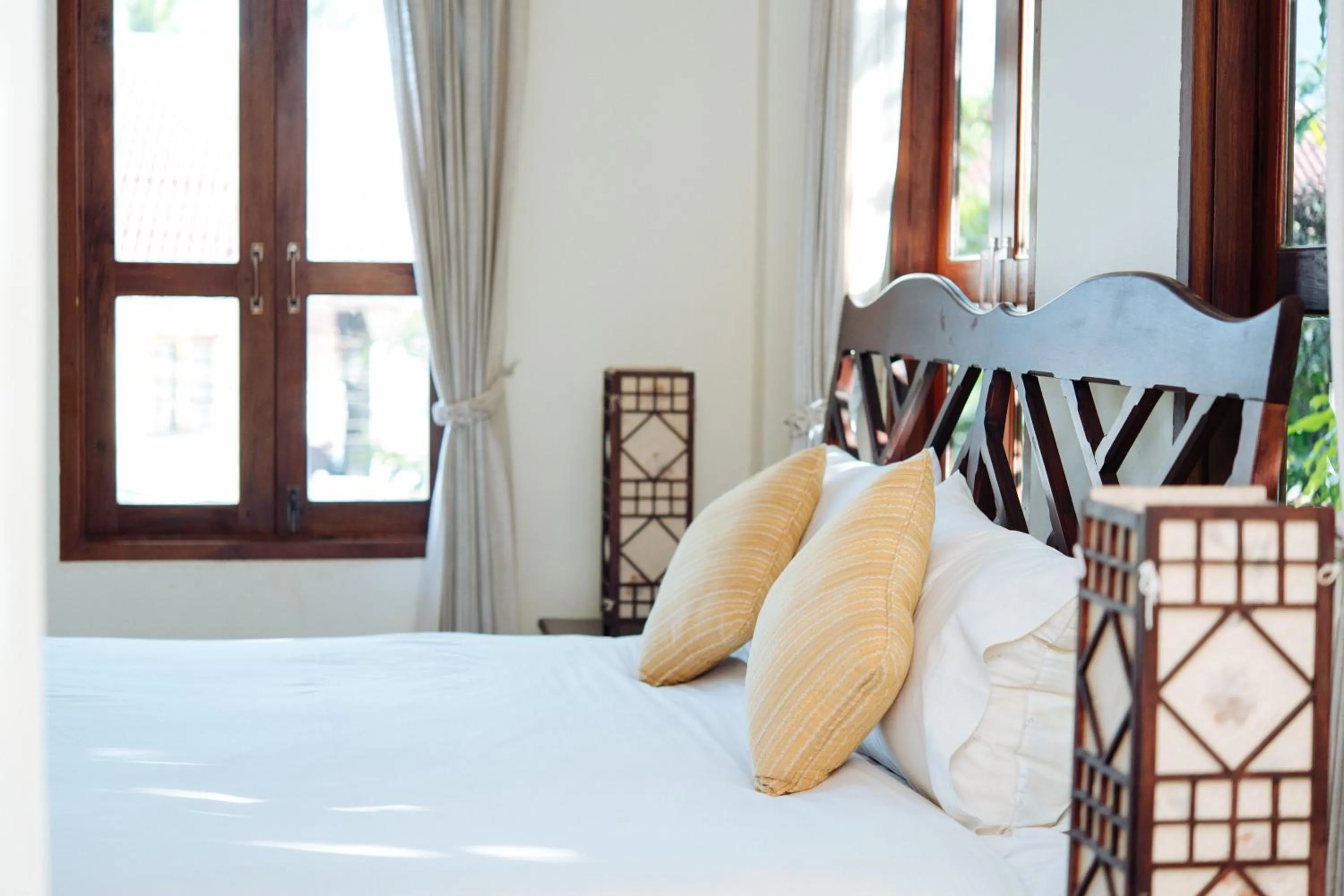 Bed in Luang Prabang Legend Hotel