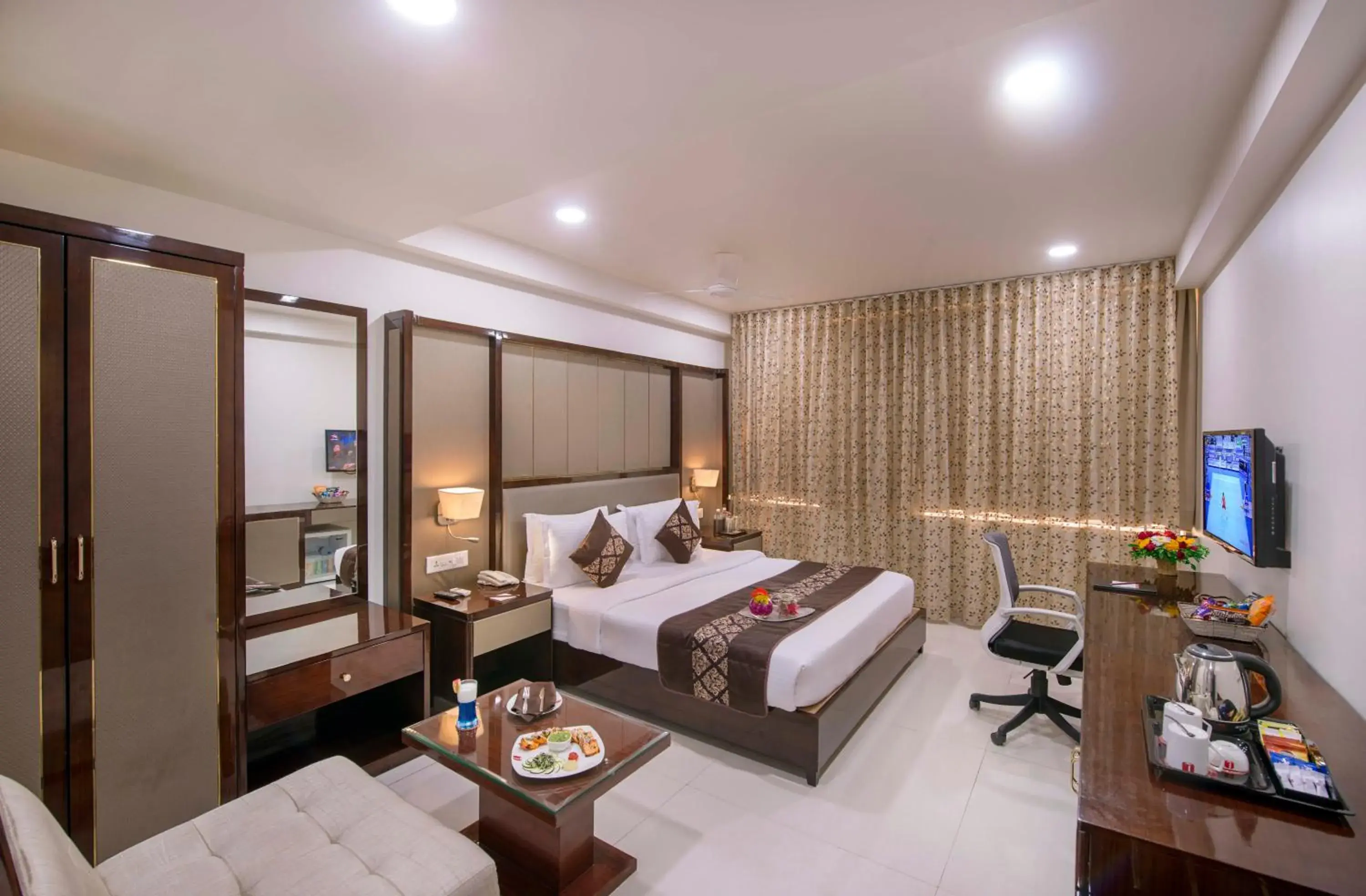 Photo of the whole room, Bed in Lords Inn Porbandar Photo of the whole room, Bed in Lords Inn Porbandar