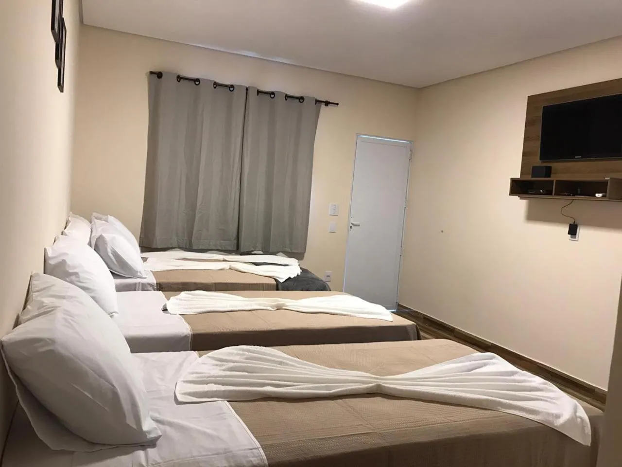 Bed in Pousada Morada dos Pássaros
