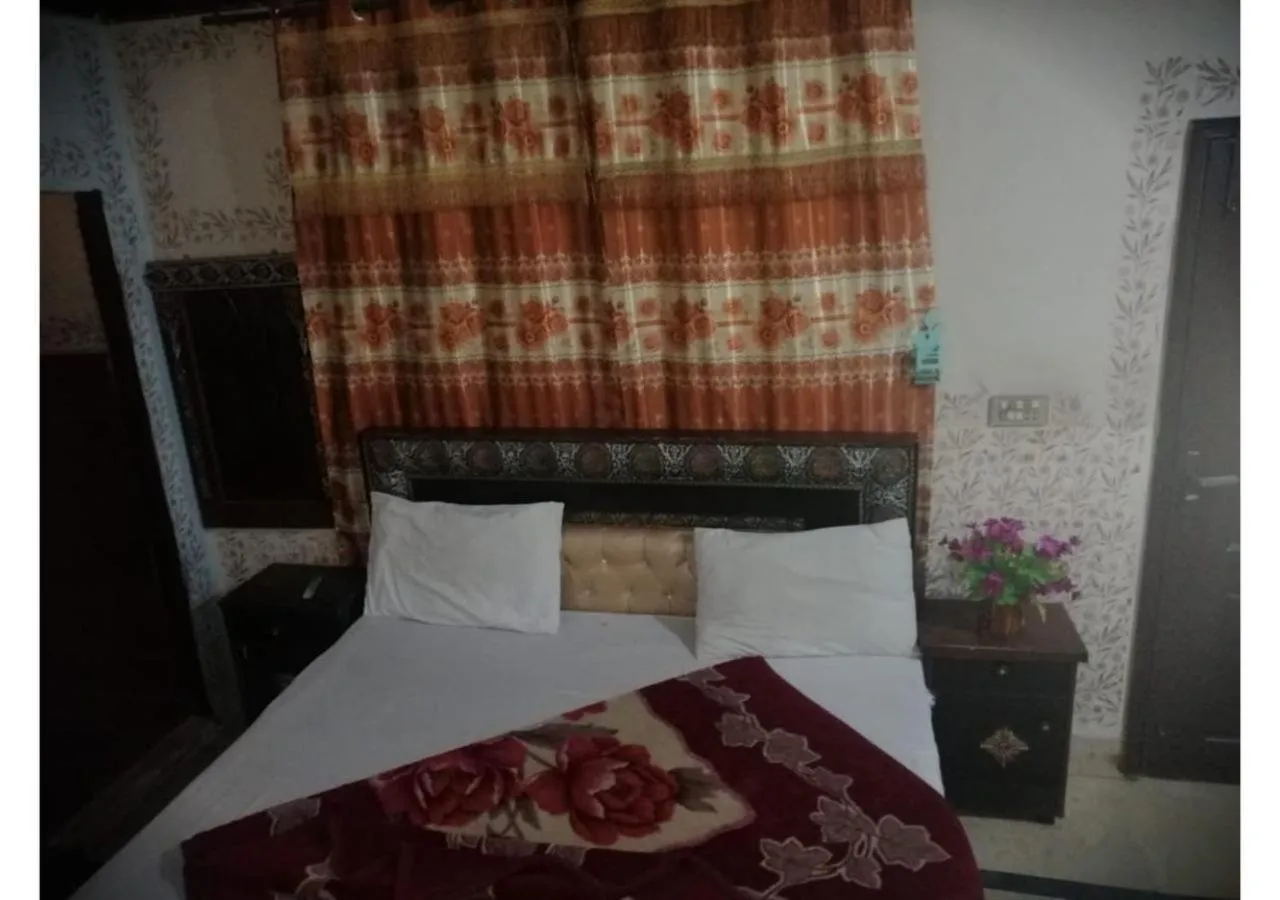 Bed in Faizan Hotel