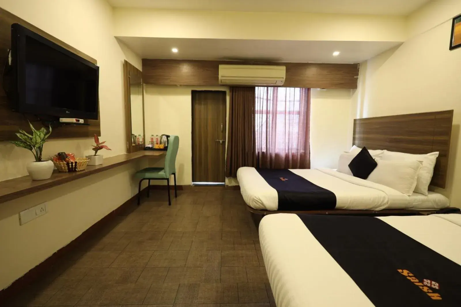 Communal lounge/ TV room, Bed in Saish Hotel Shirdi Communal lounge/ TV room, Bed in Saish Hotel Shirdi