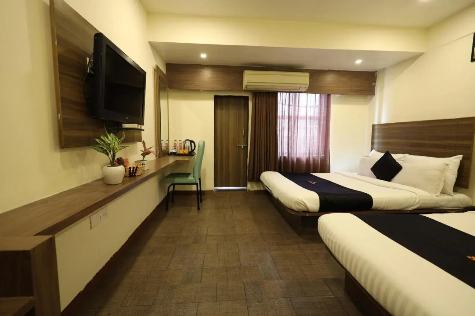 Property building, Bed in Saish Hotel Shirdi Property building, Bed in Saish Hotel Shirdi