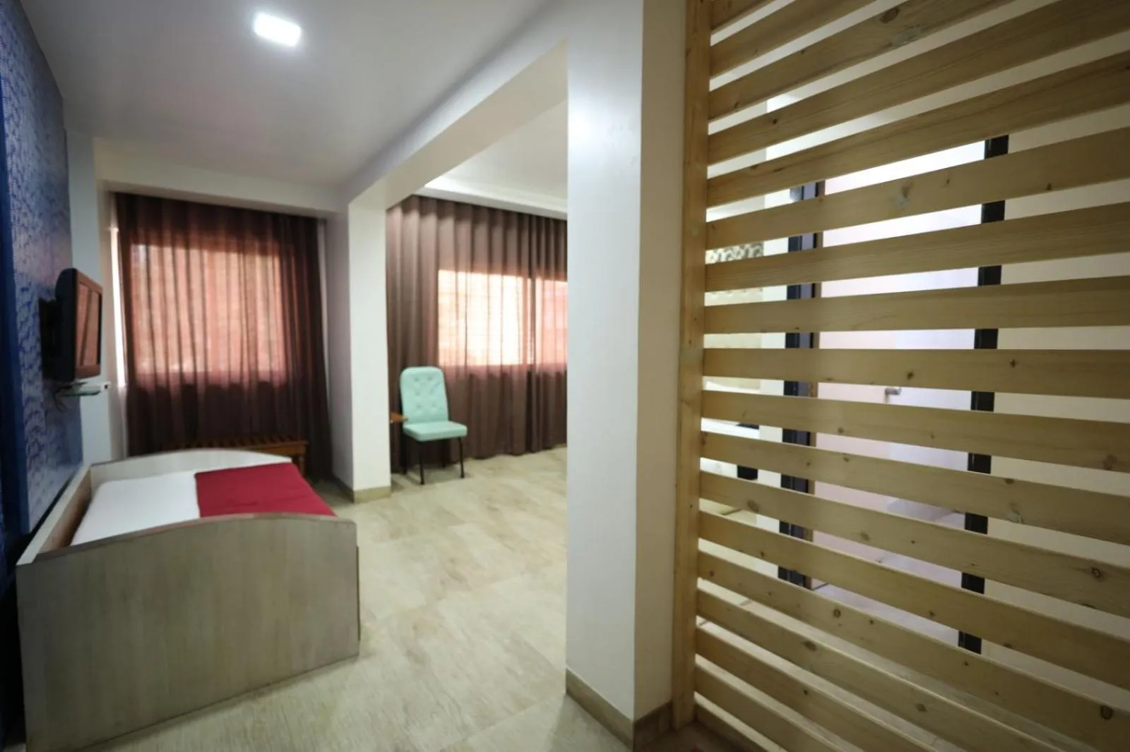 TV and multimedia, Bed in Saish Hotel Shirdi