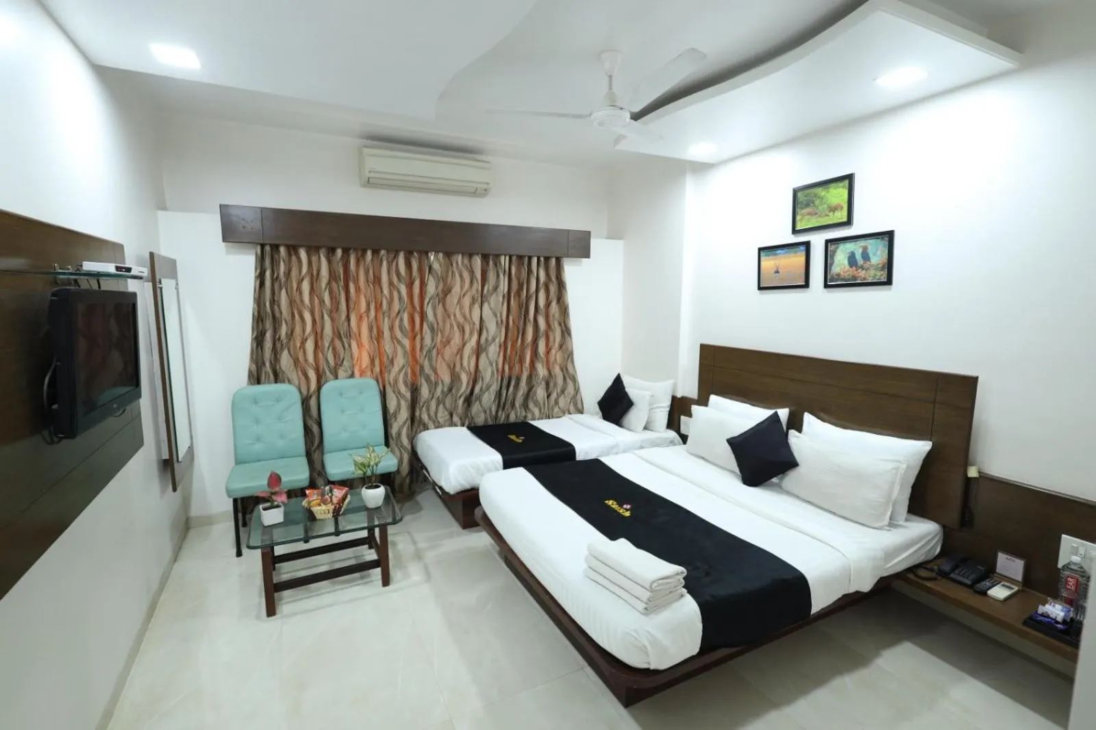Bedroom, Bed in Saish Hotel Shirdi
