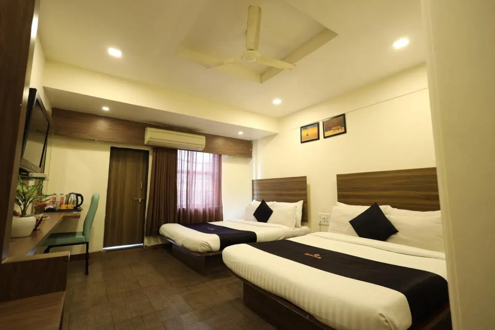 TV and multimedia, Bed in Saish Hotel Shirdi TV and multimedia, Bed in Saish Hotel Shirdi