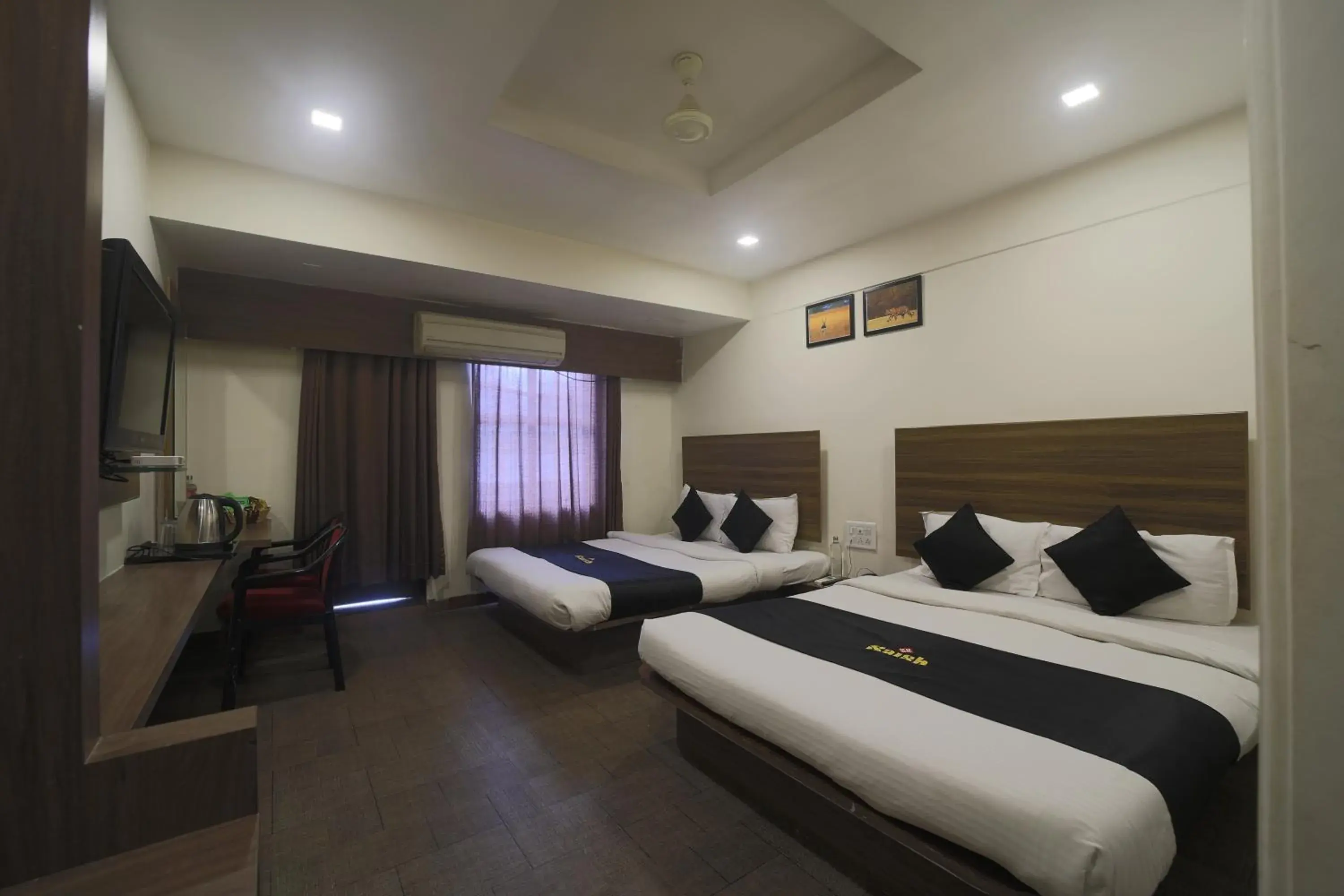 Property building, Bed in Saish Hotel Shirdi Property building, Bed in Saish Hotel Shirdi