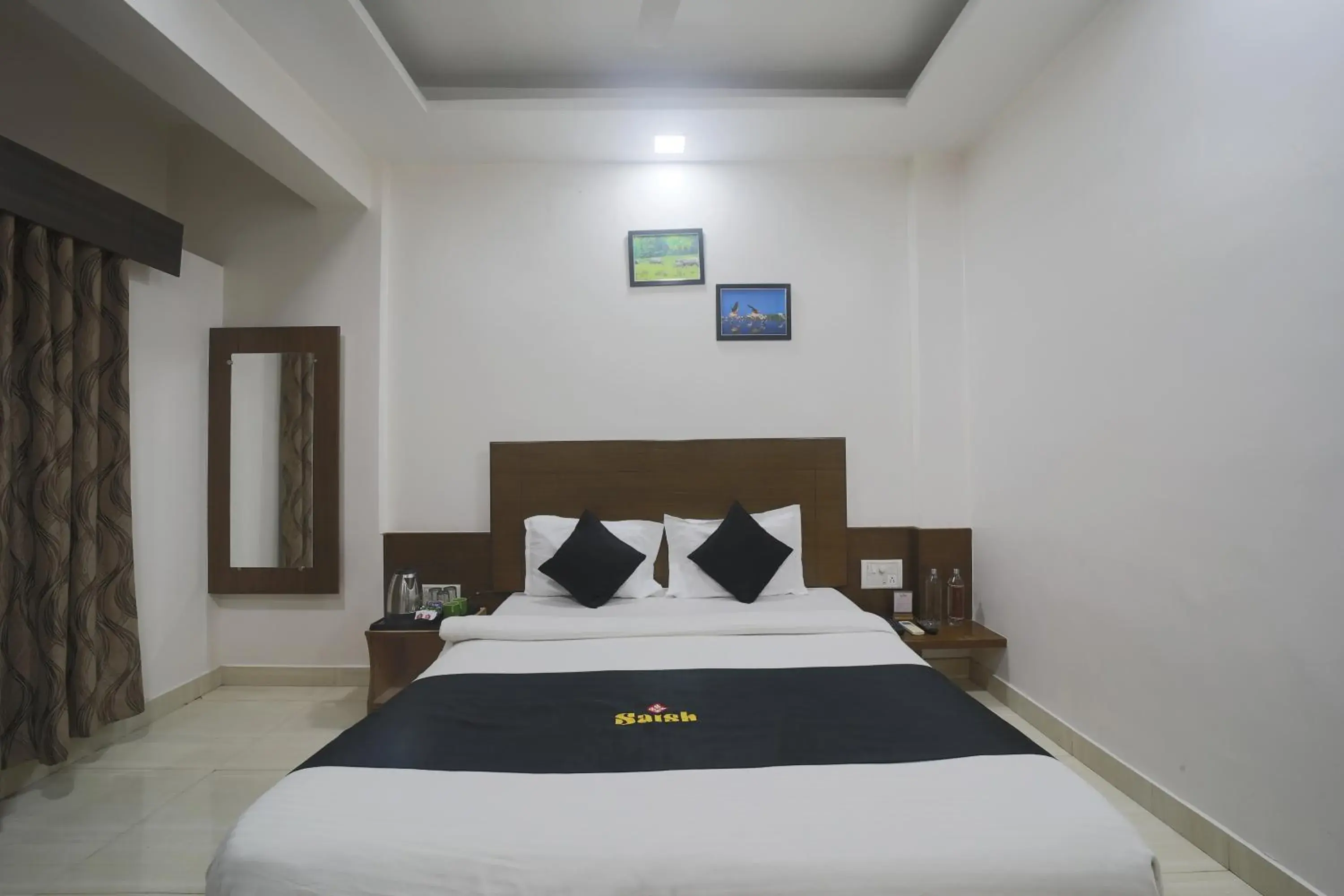 Property building, Bed in Saish Hotel Shirdi Property building, Bed in Saish Hotel Shirdi