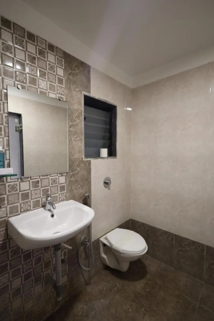 Toilet in Saish Hotel Shirdi