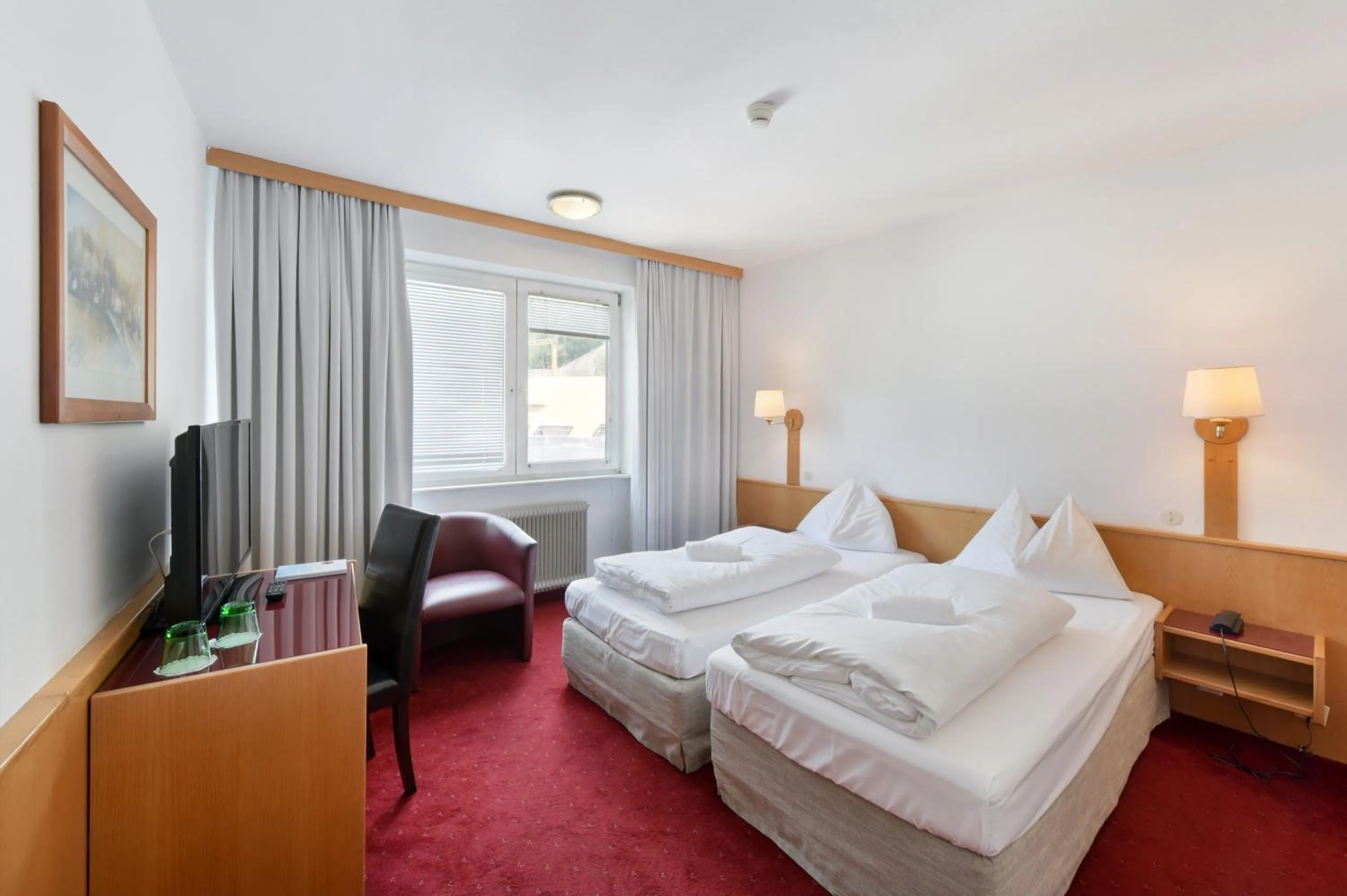Photo of the whole room, Bed in Am Neutor Hotel Salzburg Zentrum