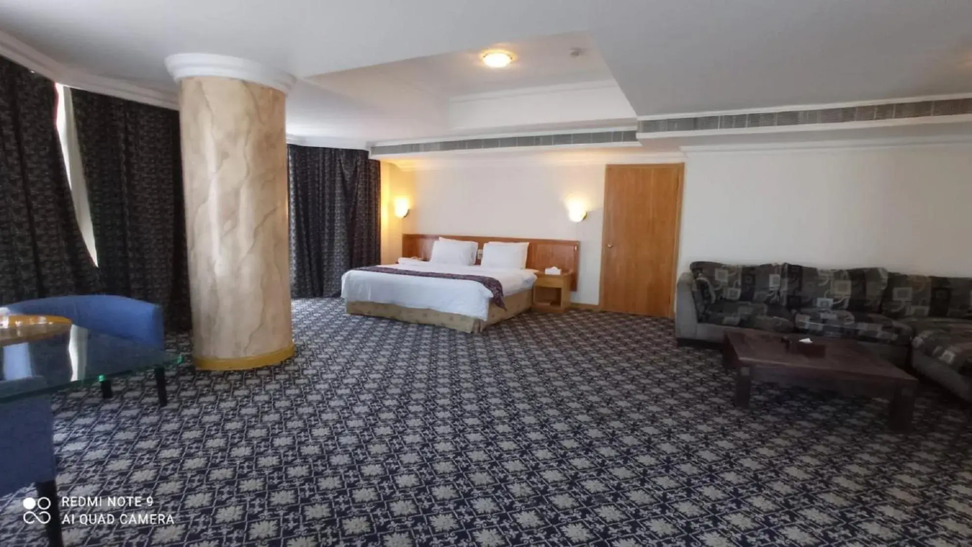 Bed, Seating Area in Phoenicia Tower Hotel