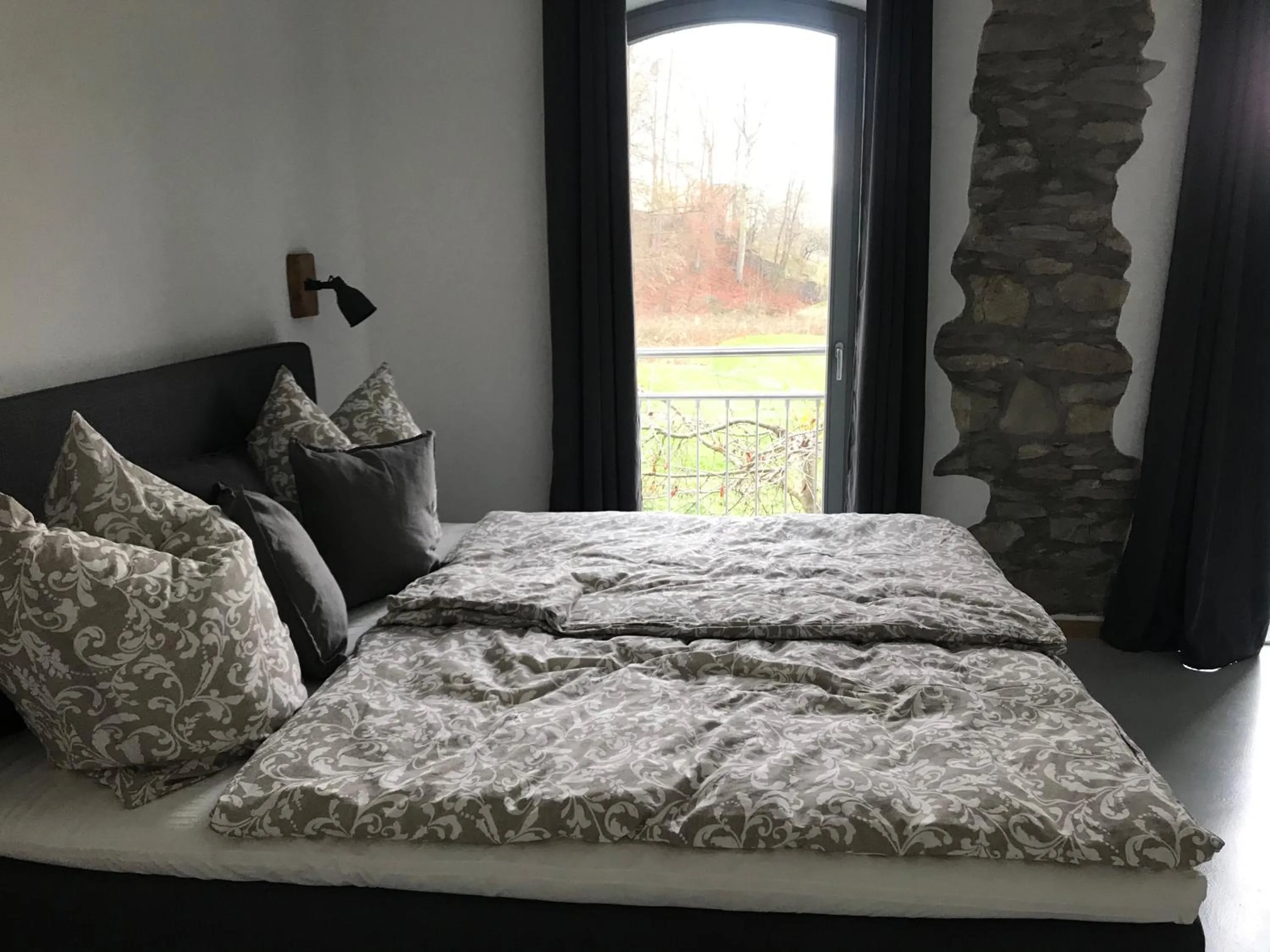 Bed in Gästehaus Lausnitz Zimmer