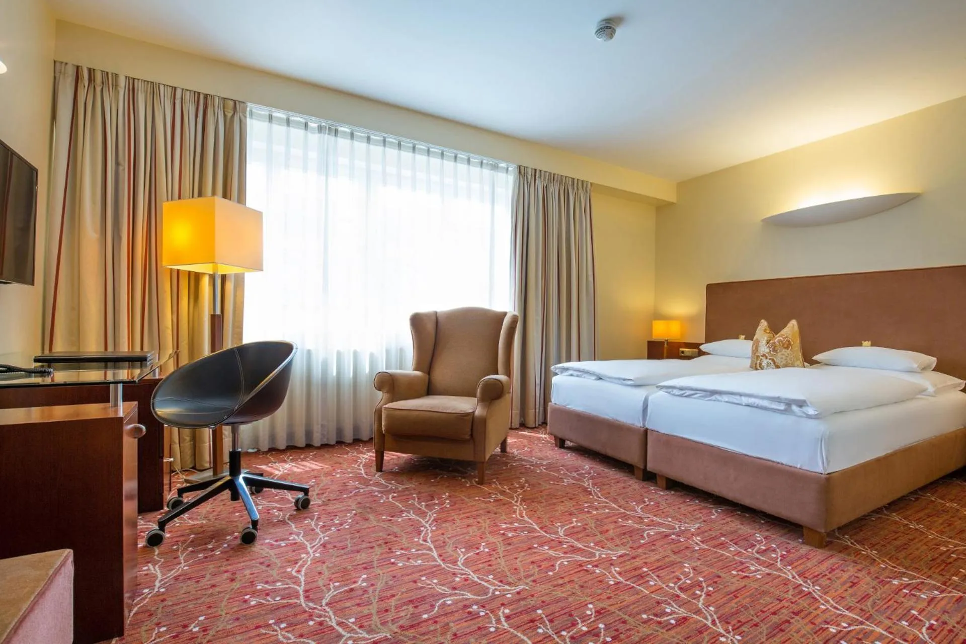 Bed in Hotel Kaiserhof Wien