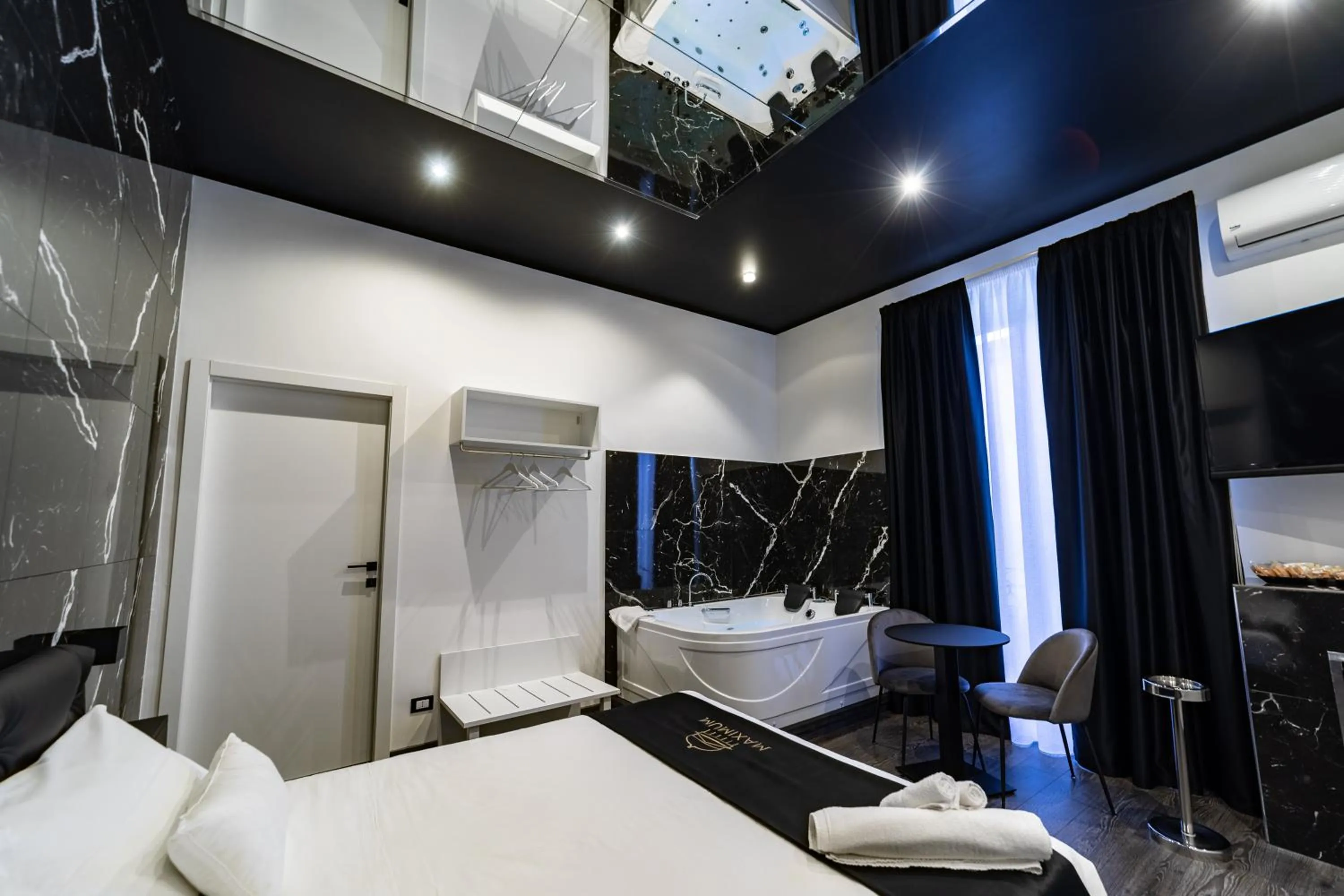 Bed in Maximum Suite & Spa