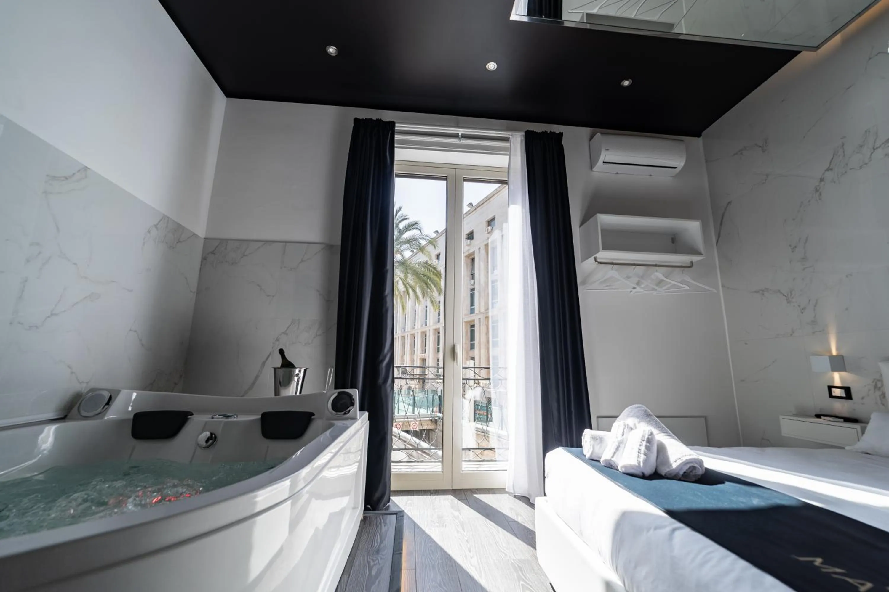 Bed in Maximum Suite & Spa