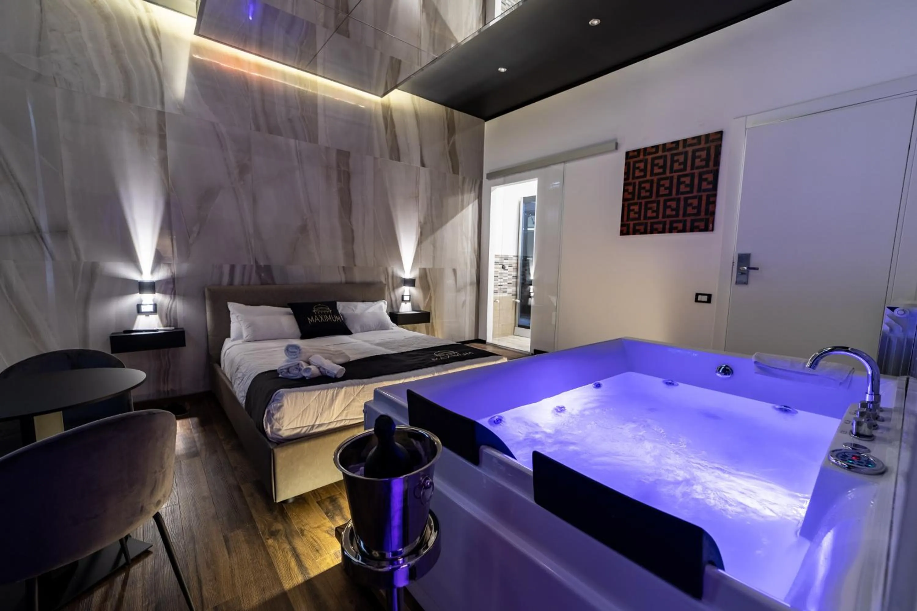 Bed in Maximum Suite & Spa