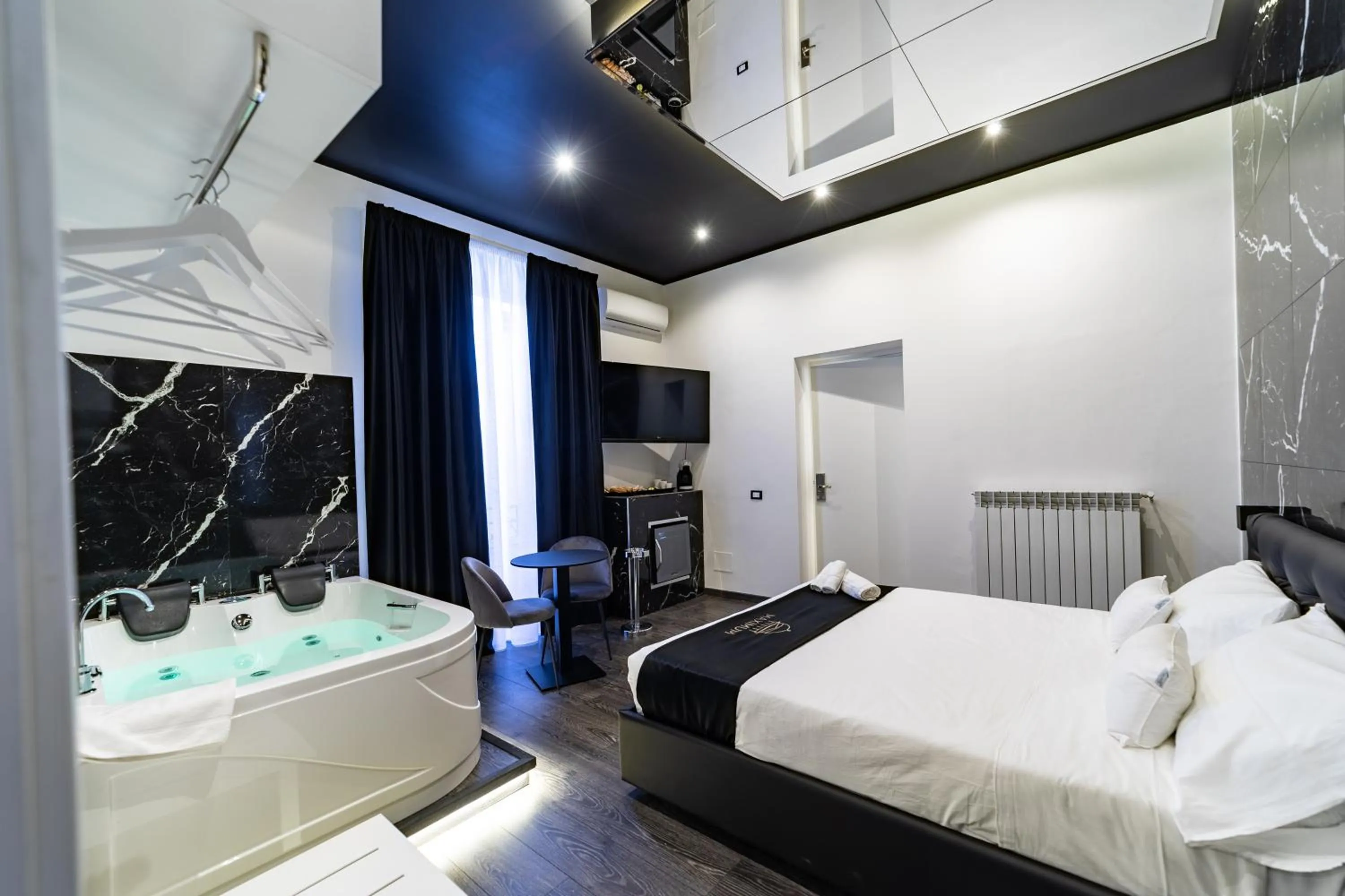 Bed in Maximum Suite & Spa