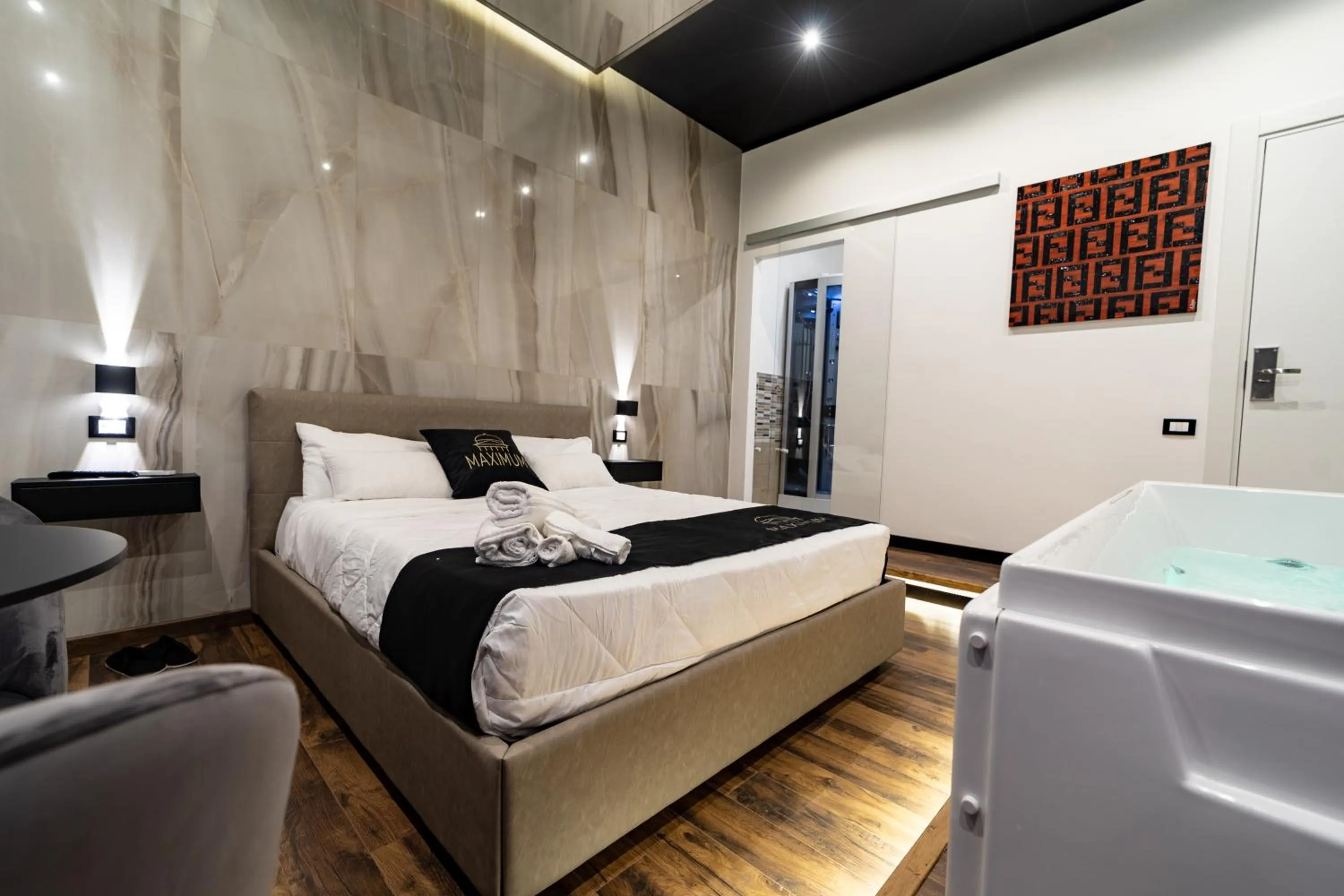 Bed in Maximum Suite & Spa