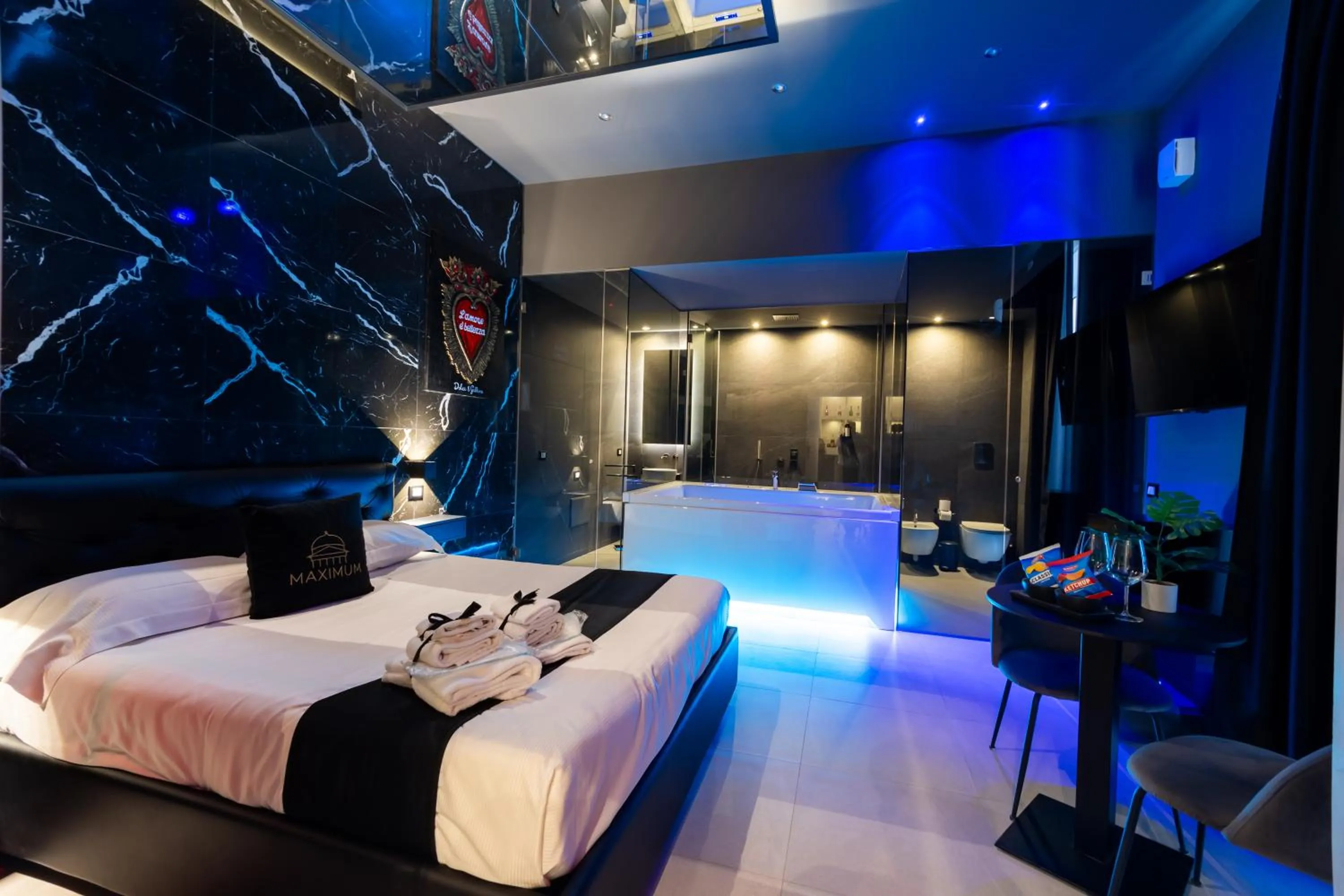 Bed in Maximum Suite & Spa