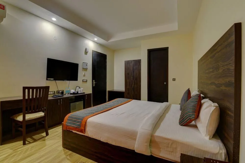 Photo of the whole room, Bed in Country Inn Vrindavan